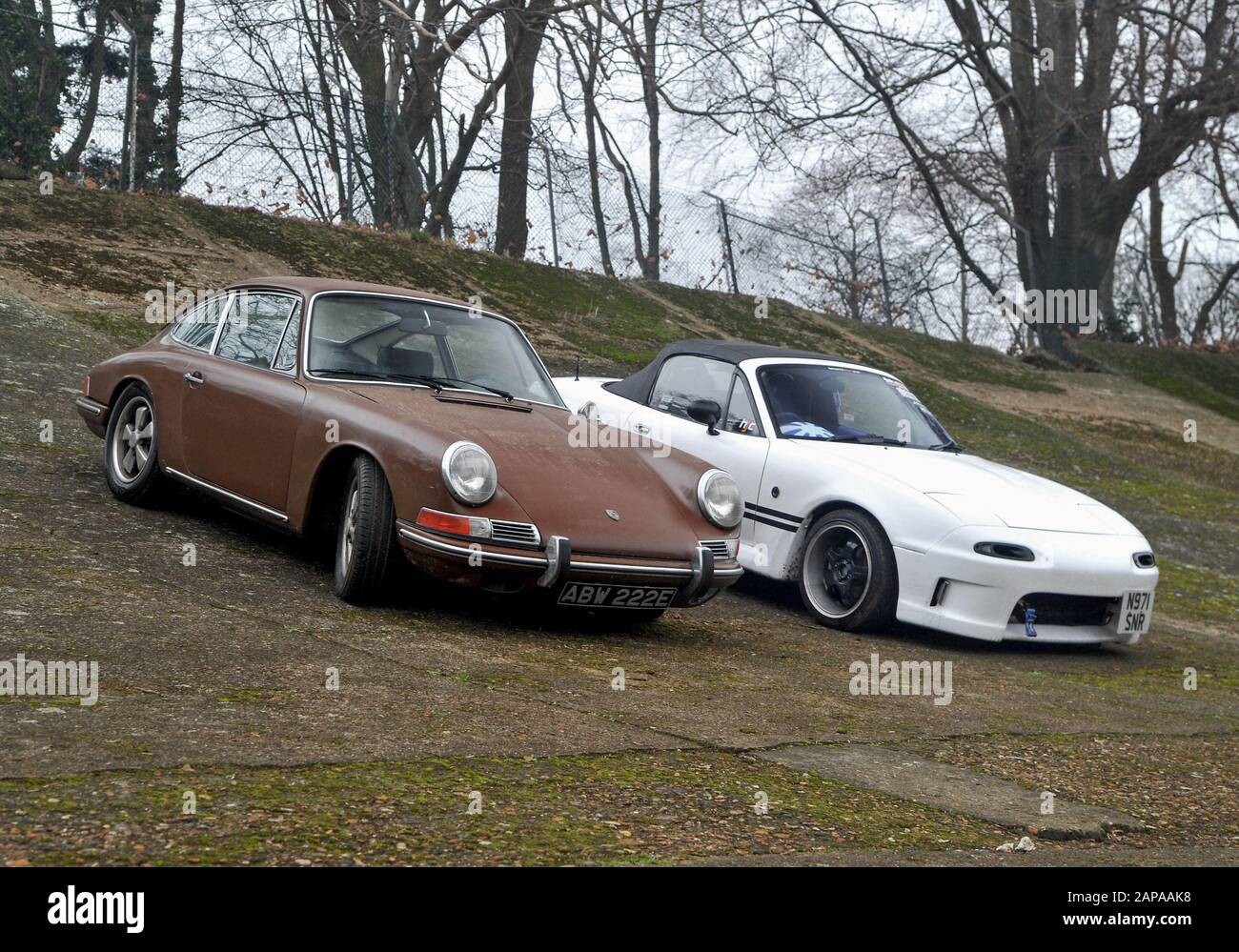 Brooklands New Years Day classic car meeting,  2015. Porsche 911 and Mazda MX5 Stock Photo