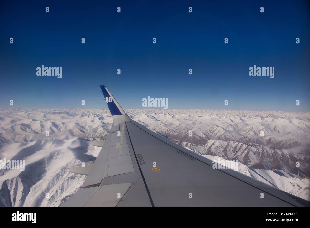 JAMMU KASHMIR, INDIA - MARCH 19 : Aerial view landscape with himalaya range mountains from airbus fly go to Kushok Bakula Rimpochee Airport at Leh Lad Stock Photo