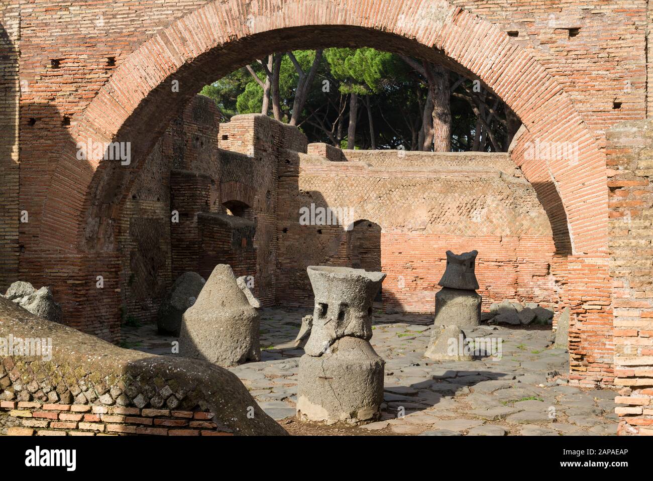 Rome. Italy. Ostia Antica. Caseggiato dei Molini (House of the Millstones) aka Molino del Silvano. Regio I Stock Photo