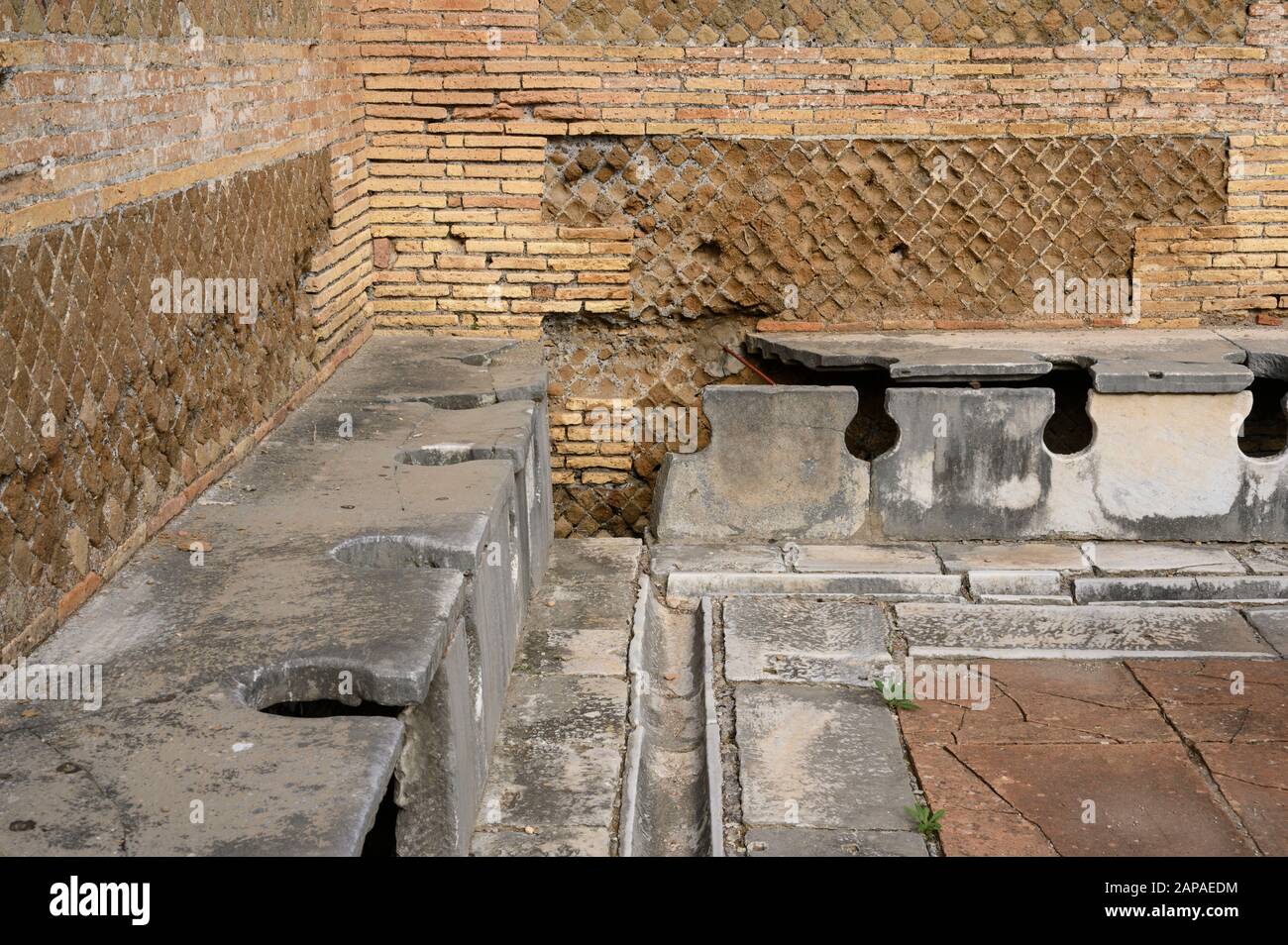 Rome. Italy. Ostia Antica. Public latrine (forica), possibly 4th century AD, Via della Forica, Caseggiato dei Triclini. Regio I Stock Photo