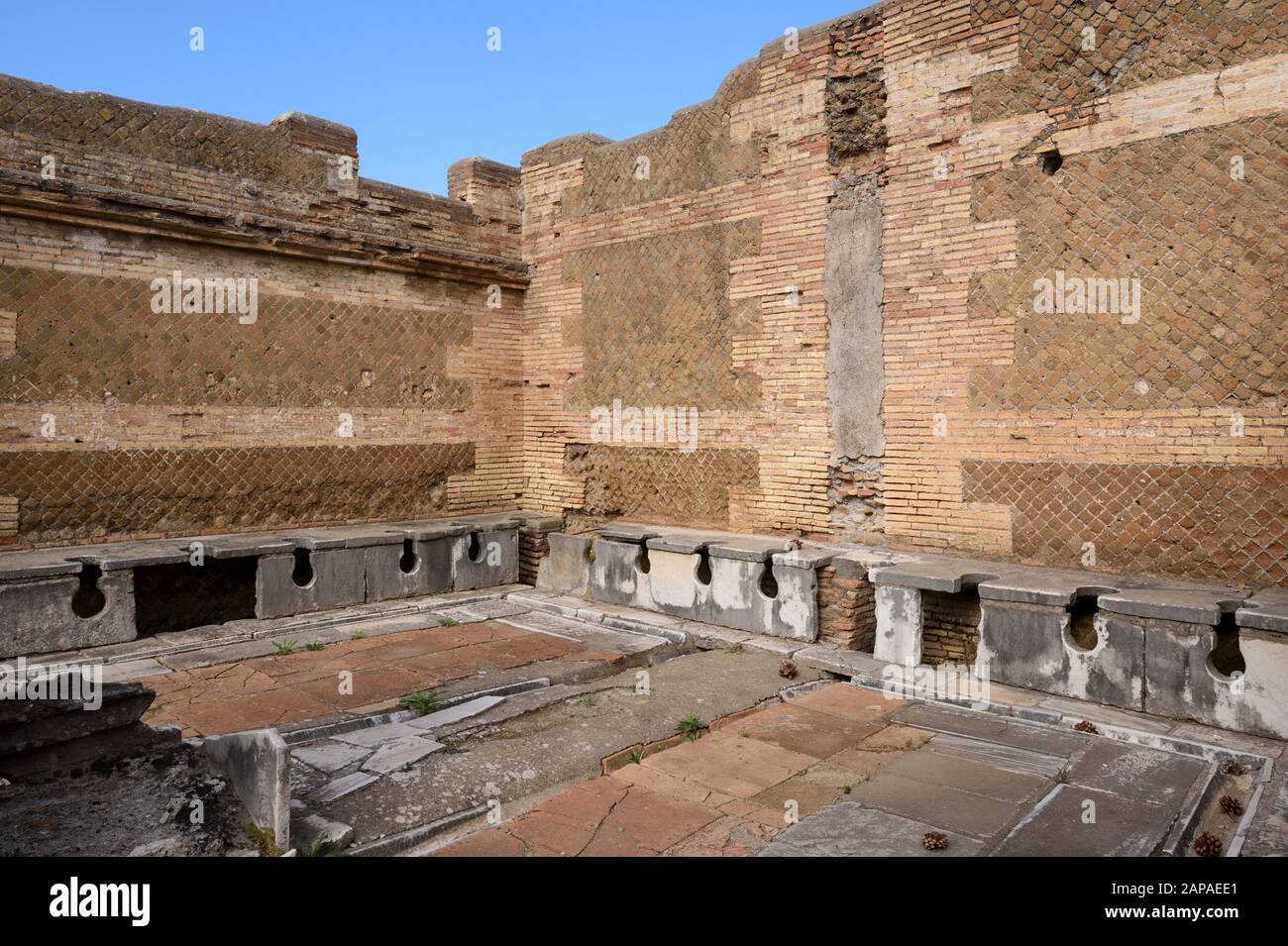 Rome. Italy. Ostia Antica. Public latrine (forica), possibly 4th century  AD, Via della Forica, Caseggiato dei Triclini. Regio I Stock Photo - Alamy