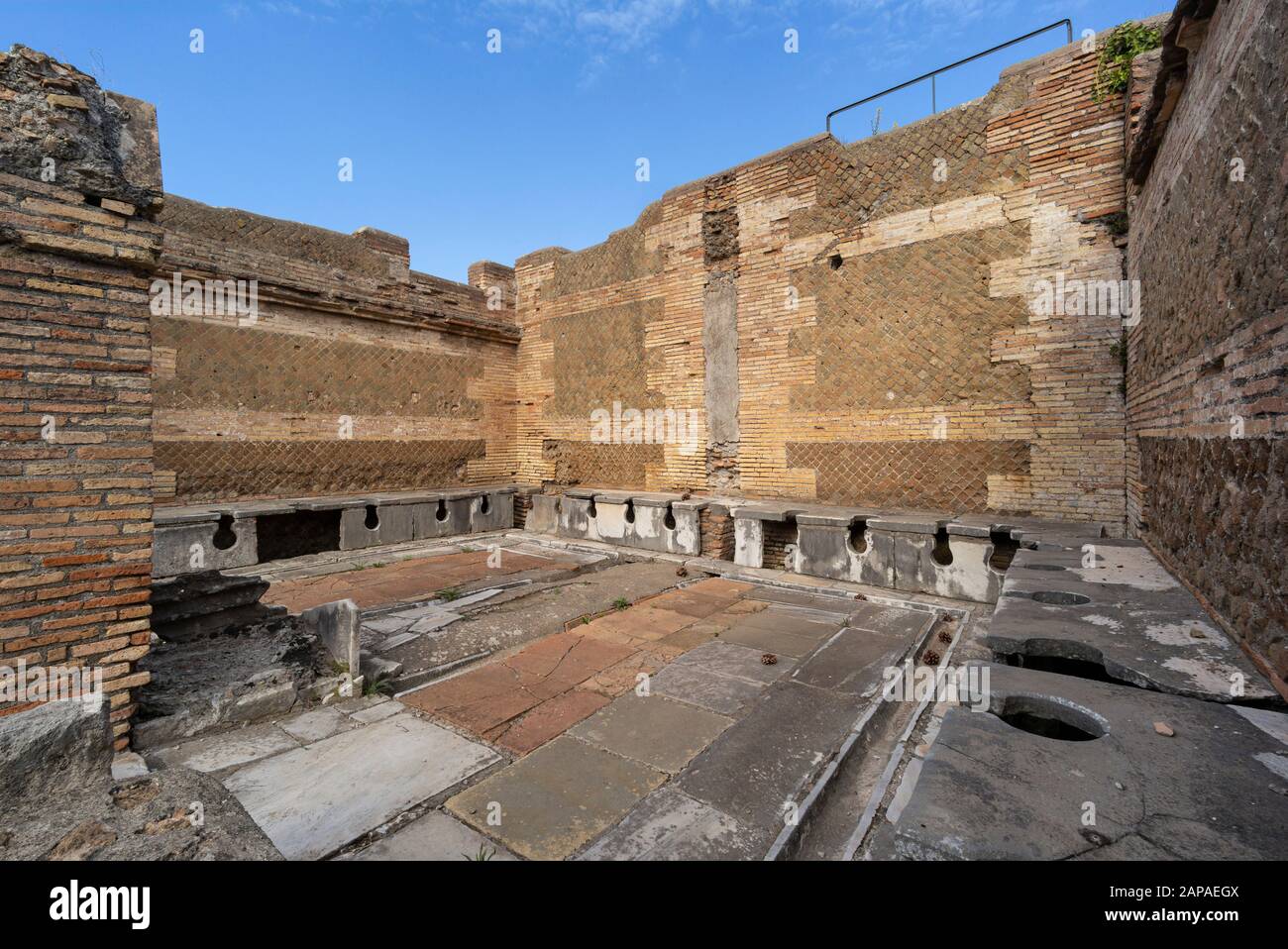 Rome. Italy. Ostia Antica. Public latrine (forica), possibly 4th century AD, Via della Forica, Caseggiato dei Triclini. Regio I Stock Photo