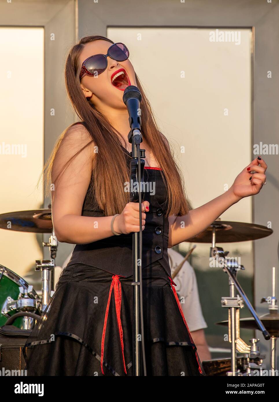 Samantha leading a new rock band  called '700 feet' in Dorset UK Stock Photo