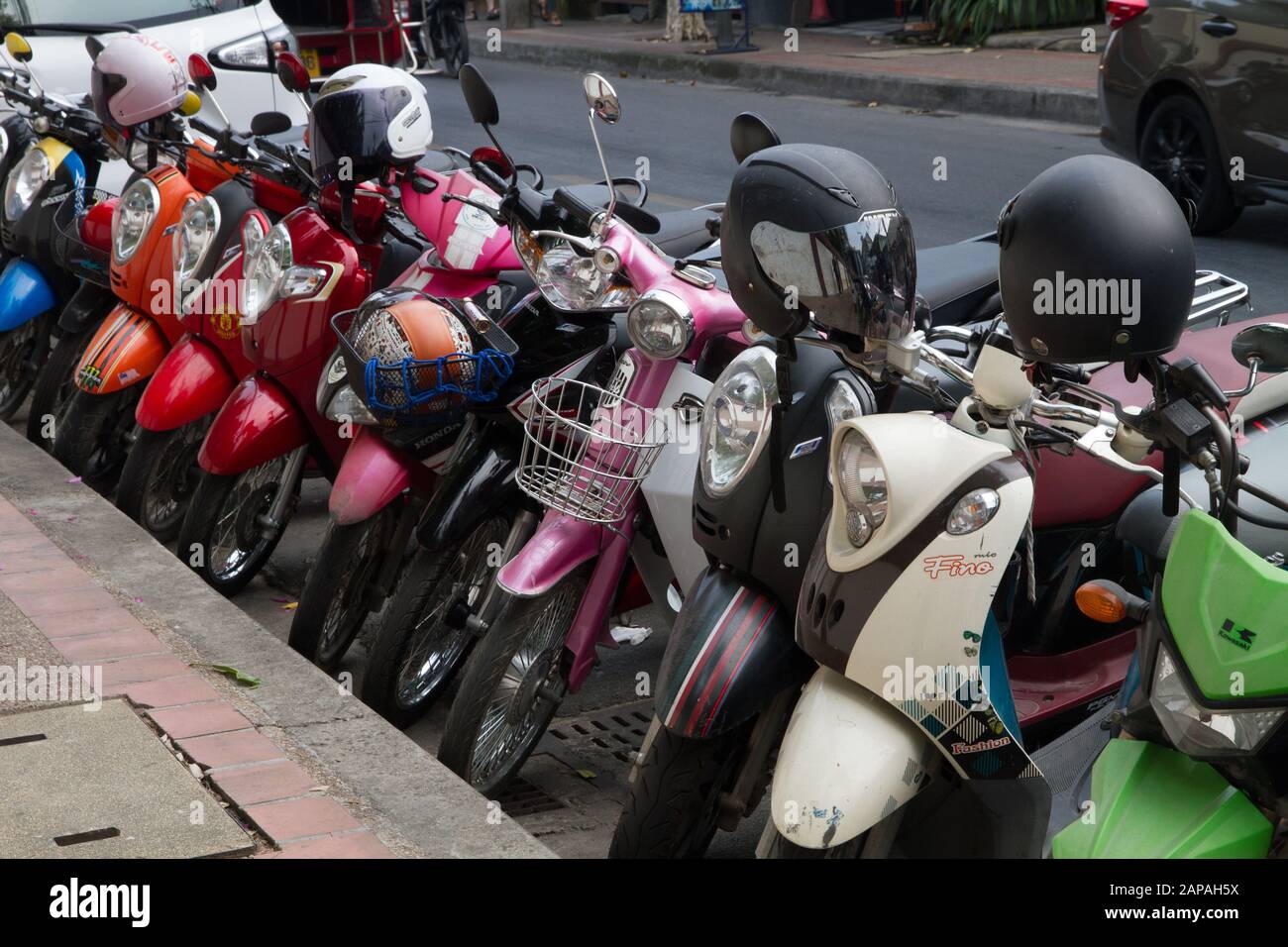 street motor bikes row line motorbikes chiang Mai chiangmai Tha Stock Photo