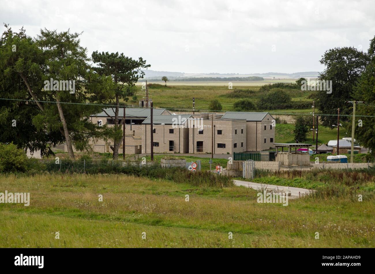 Wiltshire, UK - August 17, 2019: View of New Zealand Farm Camp used by the British Army for close combat training purpuses on the bleak Salisbury Plai Stock Photo