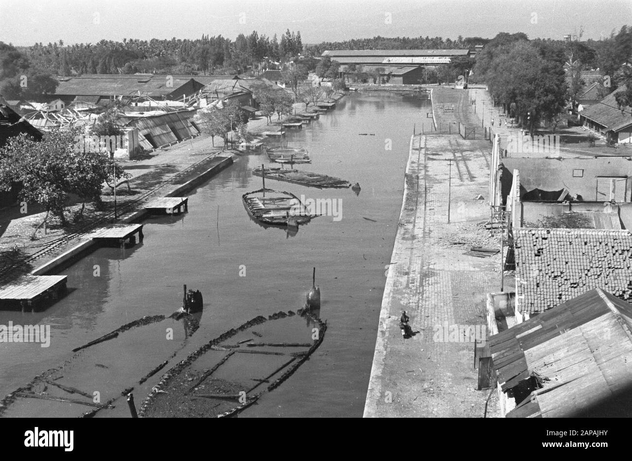 Action Cheribon (III) Description: Cheribon 28-7-47 An overview of the partially destroyed port complex of Tegal Date: 28 July 1947 Location: Indonesia, Java, Dutch East Indies Stock Photo