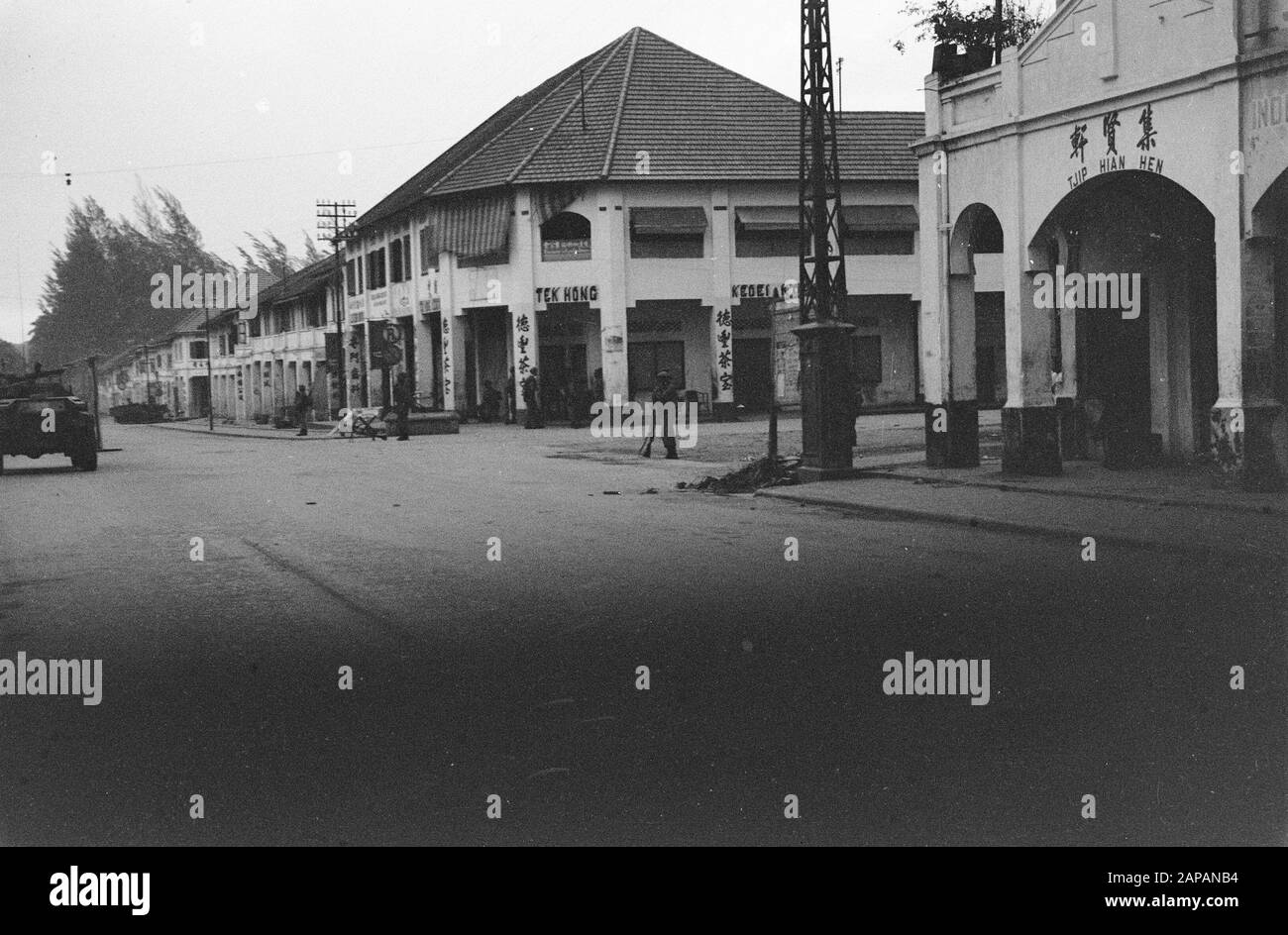 Loeboek Pakem en Baoengan Description: Occupation of Siantar. Dutch militarians on the streets. Buildings with Chinese entries Date: 29 July 1948 Location: Indonesia, Dutch East Indies, Sumatra Stock Photo