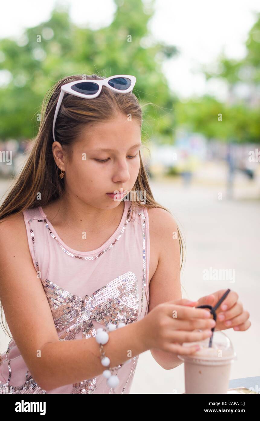 Stylish Teenager 16-18 Years Old in Sunglasses Outdoors on the Background  of Nature. Adolescence Stock Photo - Image of caucasian, teenager: 229819330