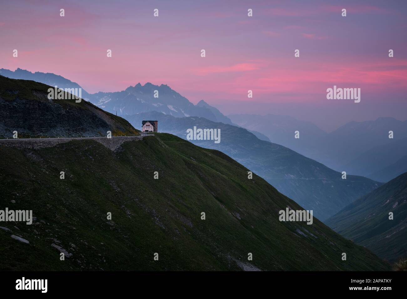 The Hotel Furka Blick on the Furka Pass mountain road at dusk in the Swiss Alps mountain top landscape of Realp, Uri, Switzerland EU Stock Photo