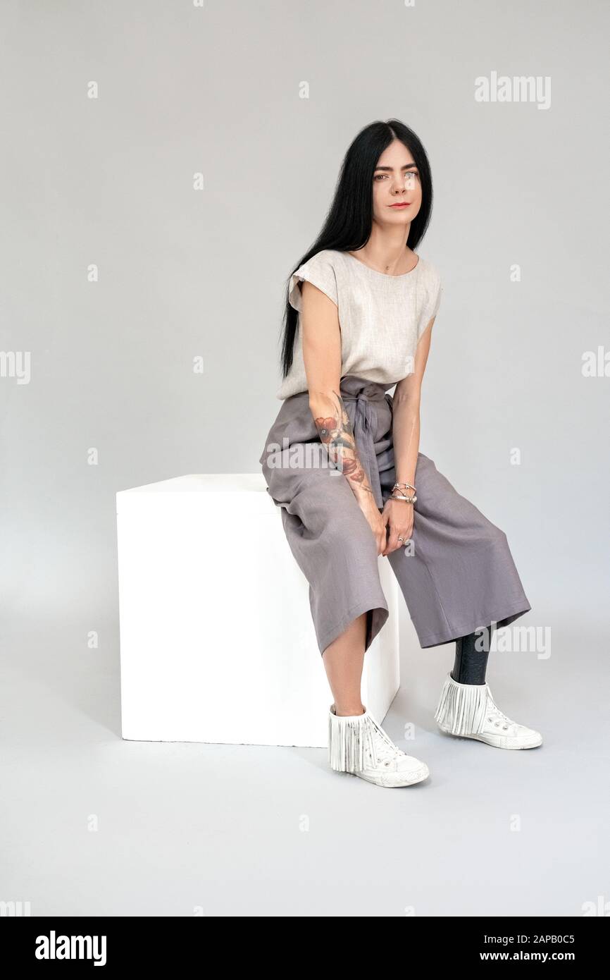 Woman with prosthetic leg is happy, despite her condition Stock Photo -  Alamy