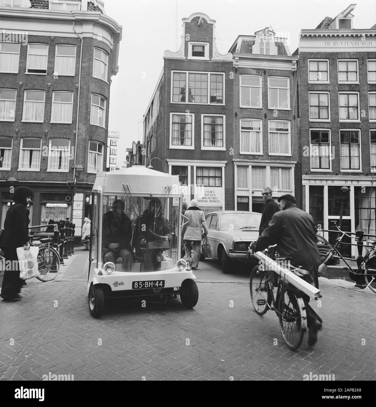 The witkar in Amsterdam Description: The witkar drives over a bridge Date: 19 February 1974 Location: Amsterdam, Noord-Holland Keywords: vehicles Stock Photo