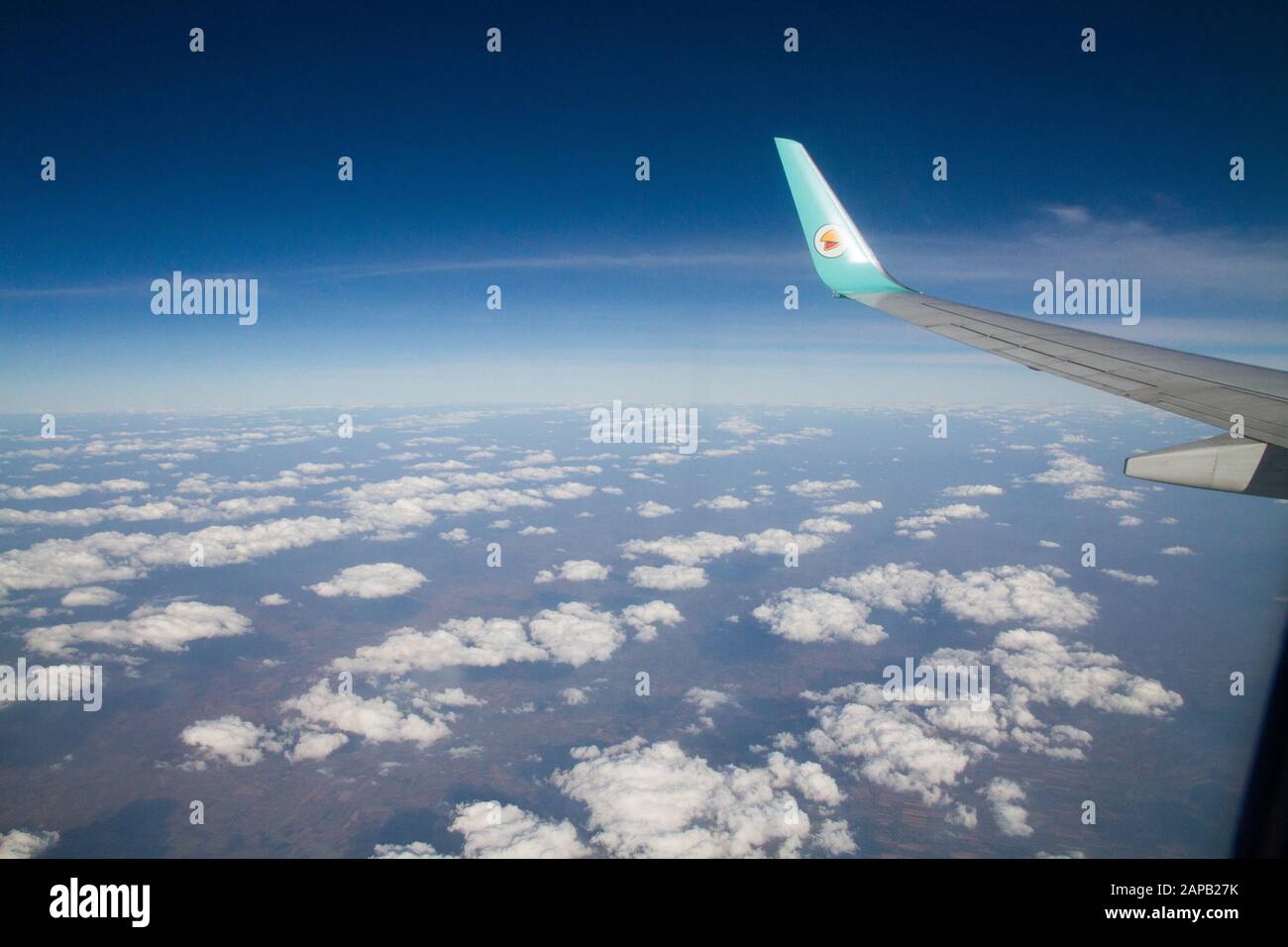 Airplane Wing Nok air local fly Thailand Stock Photo