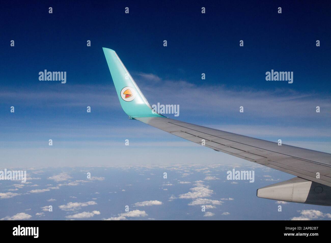 Airplane Wing Nok air local fly Thailand Stock Photo