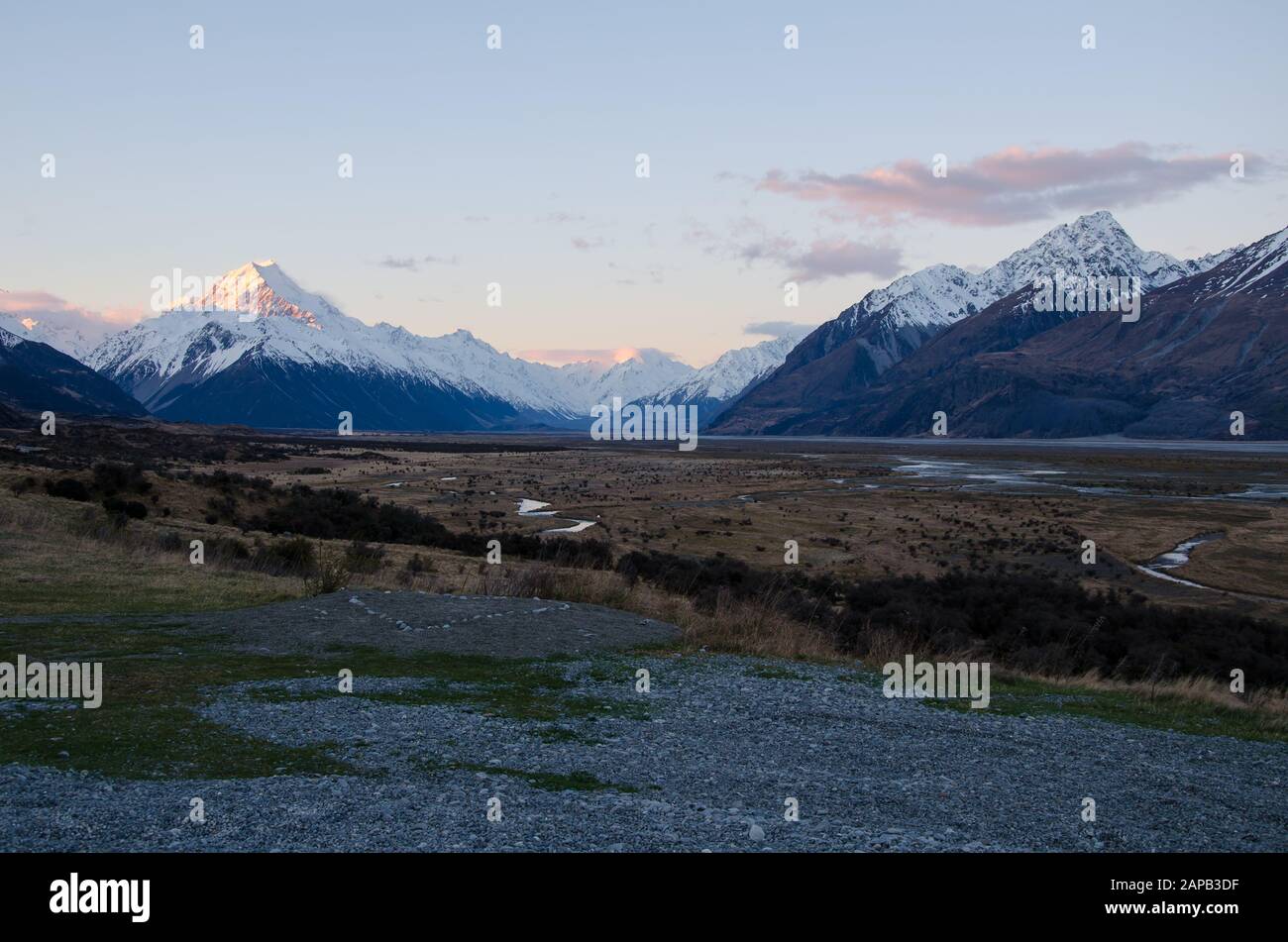 Snow covered Mount Cook at sunset golden hour, South Island, New Zealand Stock Photo