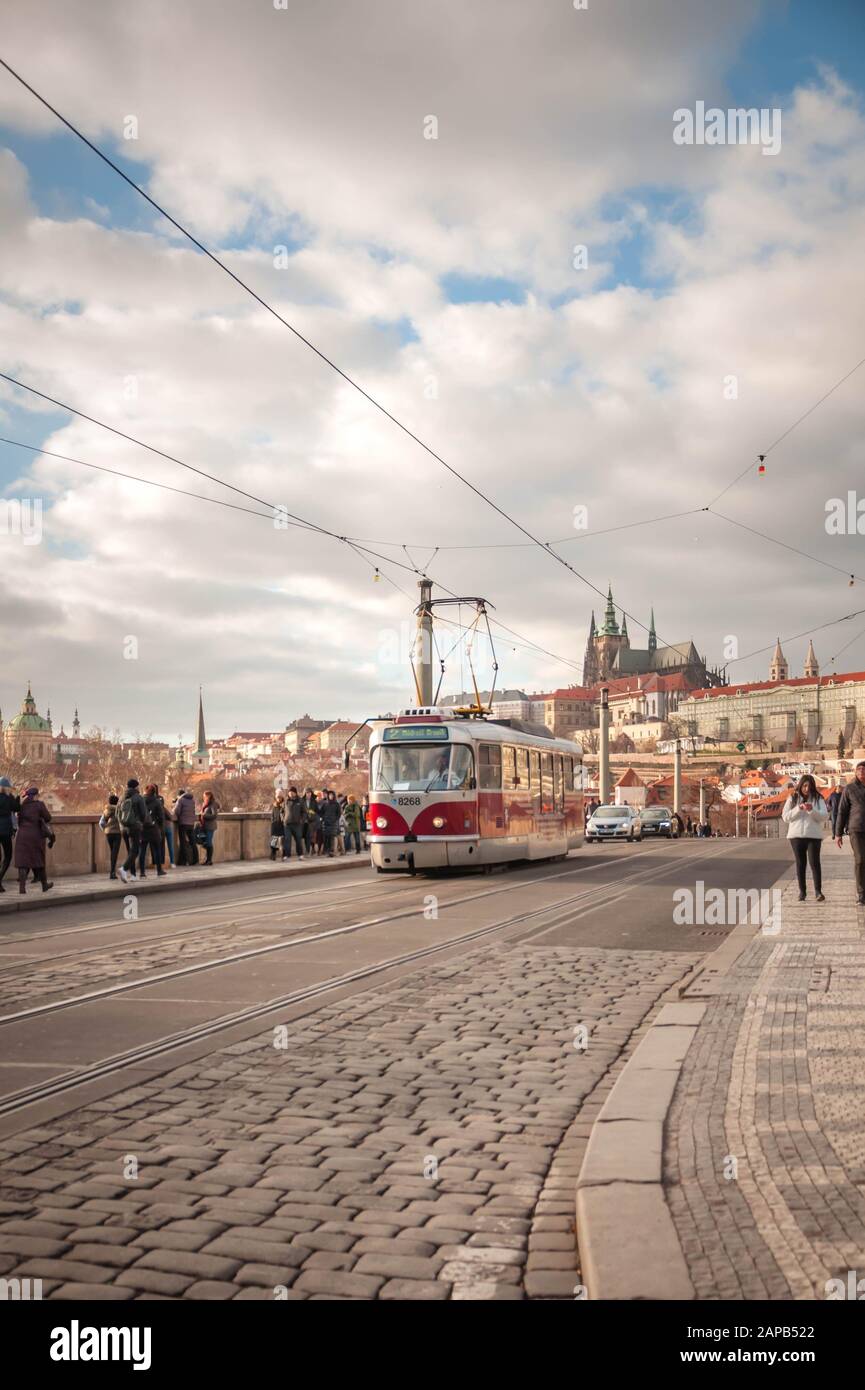 Prague, Czech Republic 1/5/2020: Mánes Bridge, over the Vltava river. Tramway passing by. Stock Photo