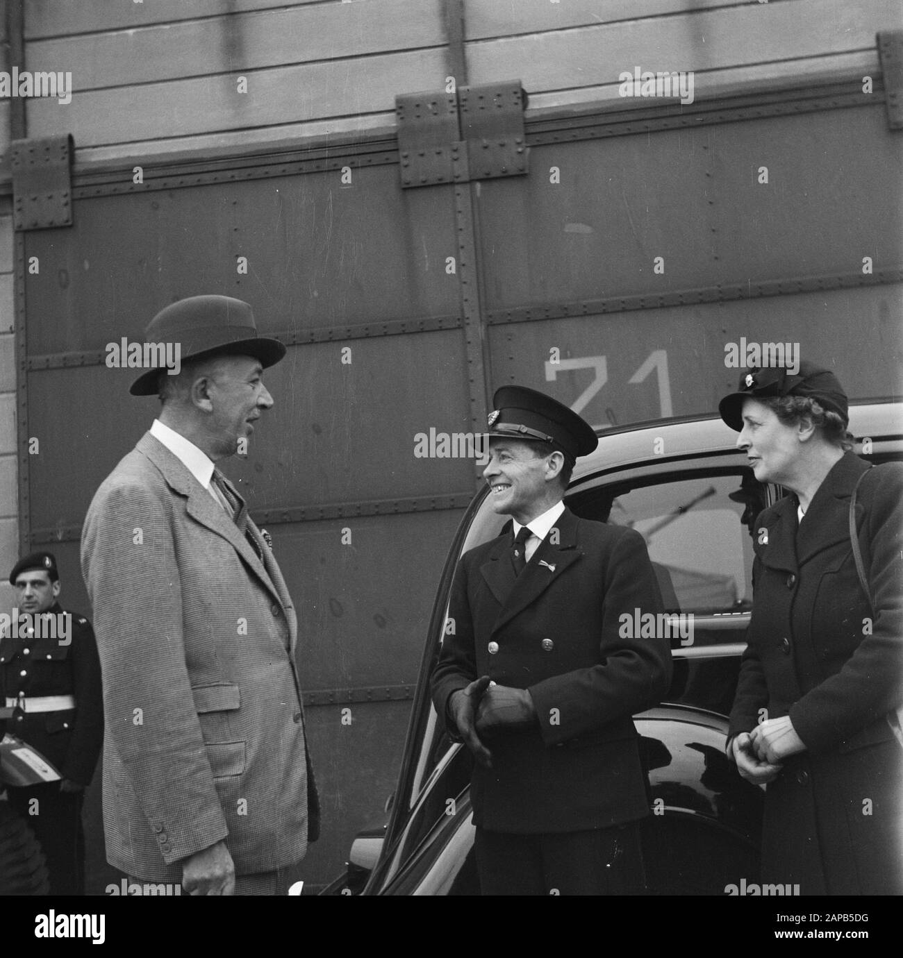 Diplomacy: English ambassador Description: Arrival of the English envoy Sir Neville Bland at the Lloydskade in Rotterdam. Sir Neville Bland and wife meet their old driver L.P. Luit, who had the Ambassador's car in hiding and stayed in the Netherlands Date: 25 May 1945 Location: Rotterdam, Zuid-Holland Keywords: cars, diplomats Personal name: Bland, Neville, Luit L P Stock Photo