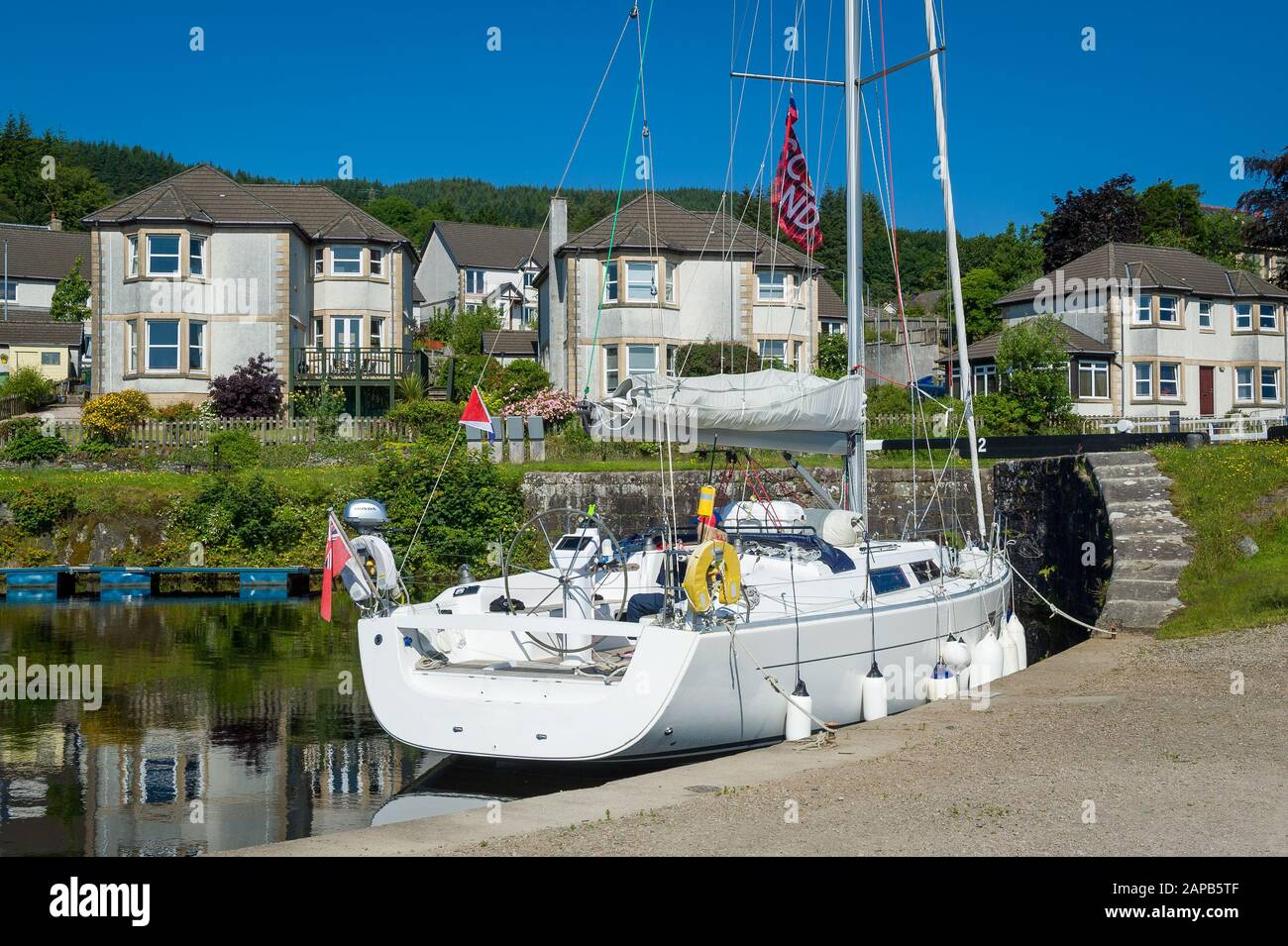 Modern sailing boat docked next to Ardrishaig gates. Crinan channel, Scotland. Stock Photo