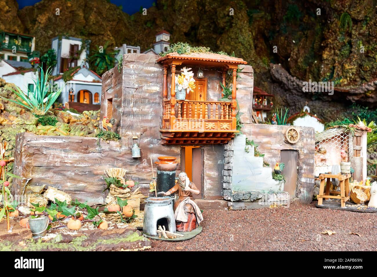 Candelaria, Tenerife, Spain - December 12, 2019: Detail of Christmas Belen -  Crib, Nativity Scene, statuettes of people and houses in miniature Stock Photo