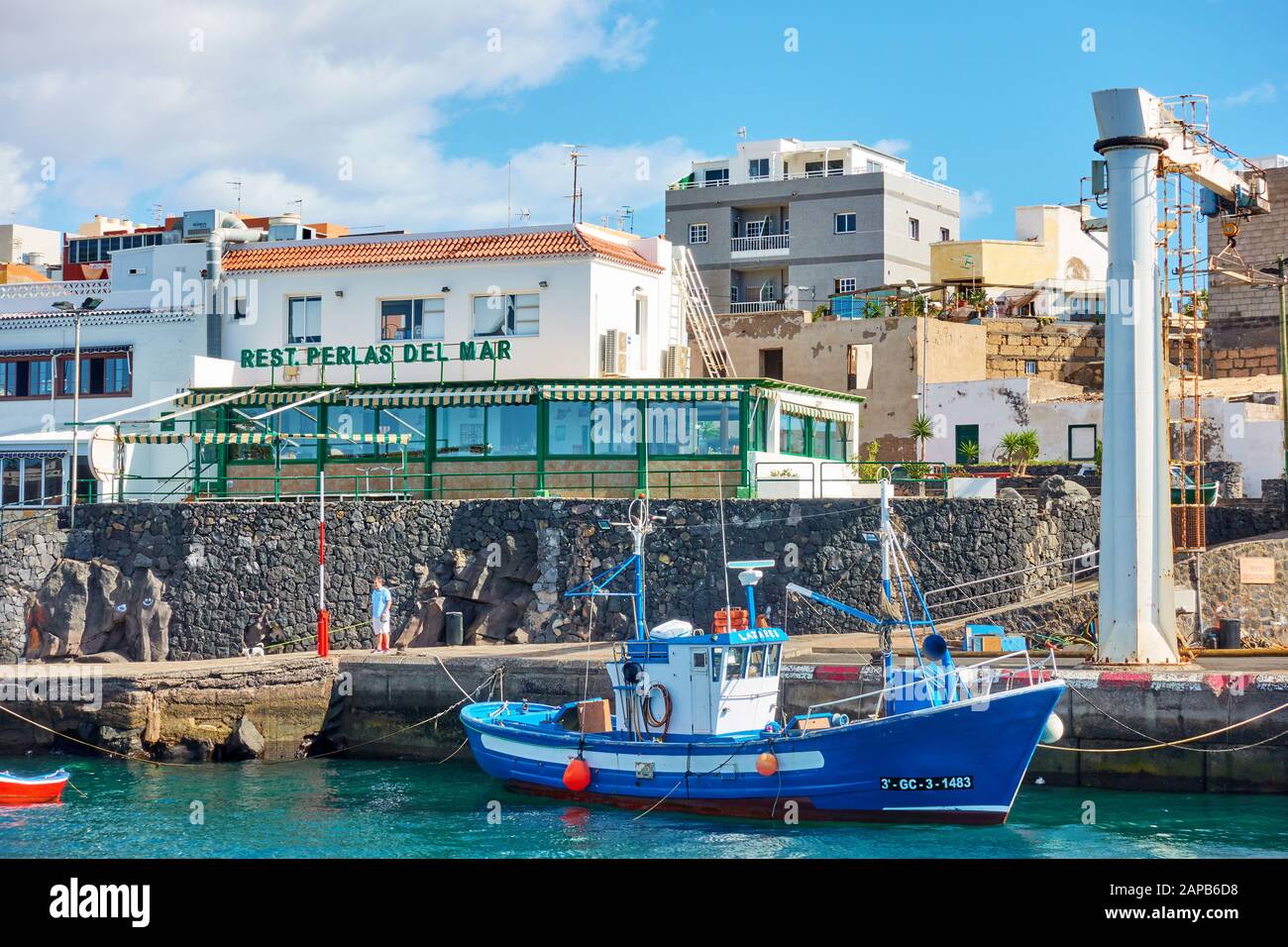 Los Abrigos, Tenerife, Spain - December 16, 2019: Fishing boat and seafood  restaurants in small port in Los Abrigos town, Tenerife Island, The Canarie  Stock Photo - Alamy