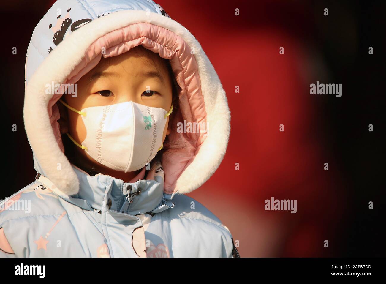 Beijing, China. 22nd Jan, 2020. Chinese wear protective respiratory masks in Beijing on Wednesday, January 22, 2020. Health authorities in China reported the country's sixth death from a new type of coronavirus, as the country braces for the Lunar New Year travel boom amid concerns over a possible outbreak similar to that of the SARS virus in the early 2000s. Photo by Stephen Shaver/UPI Credit: UPI/Alamy Live News Stock Photo