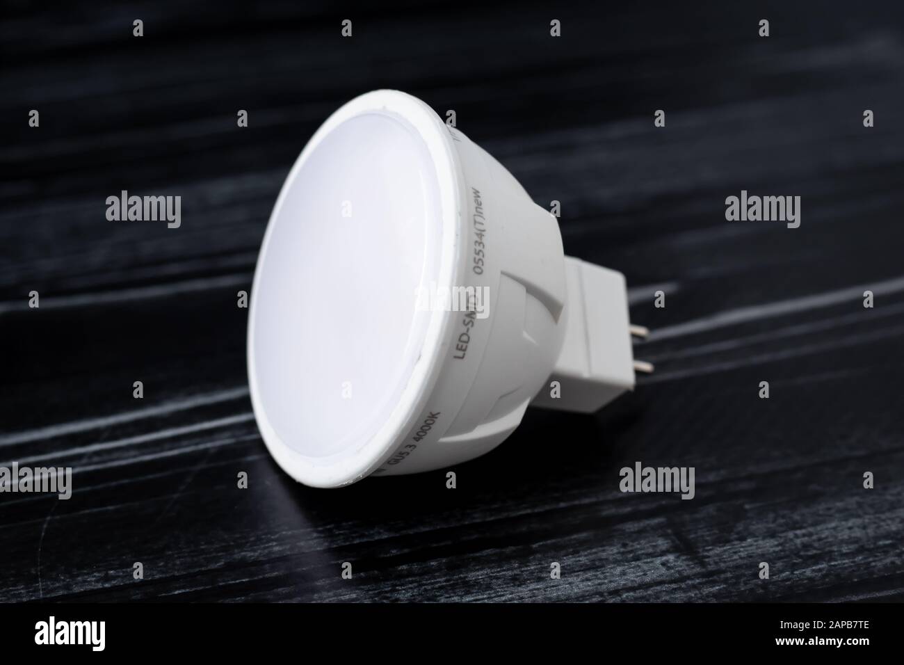 White led lamp on black background. A small diode lamp, gu 5.3 Stock Photo