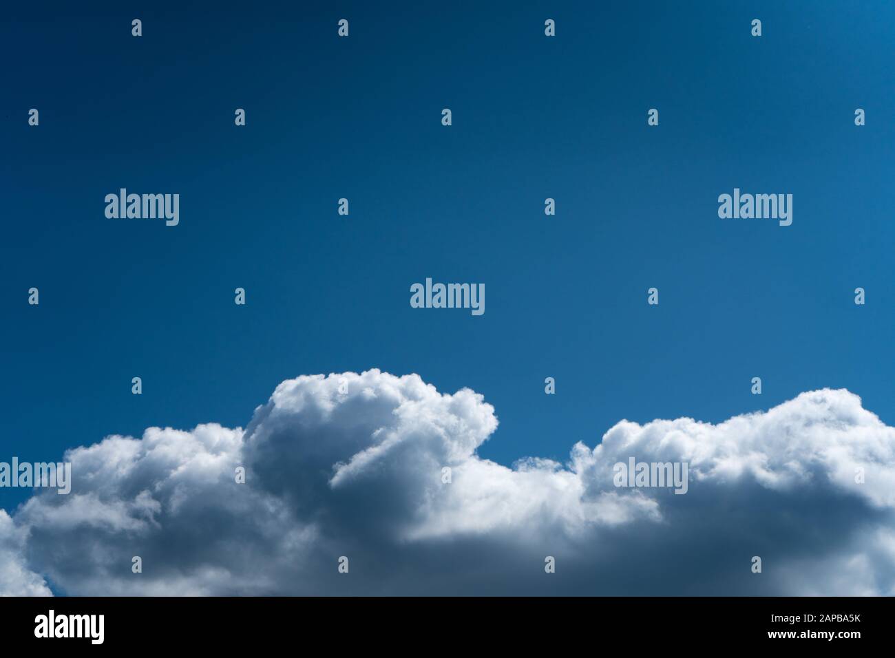 Cumulus Clouds Against a Blue Sky. Summer day Stock Photo