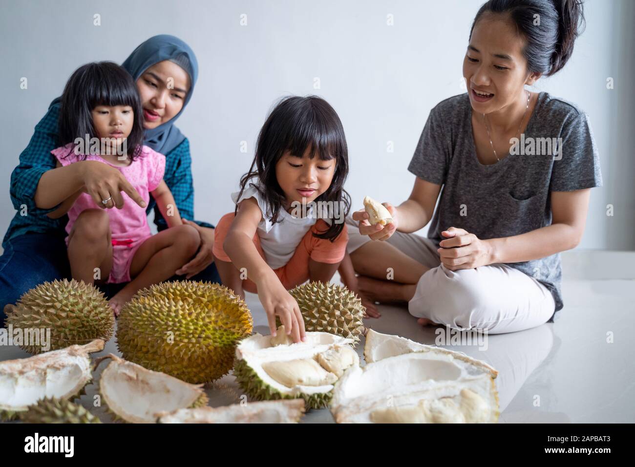 family eating durian Stock Photo Alamy