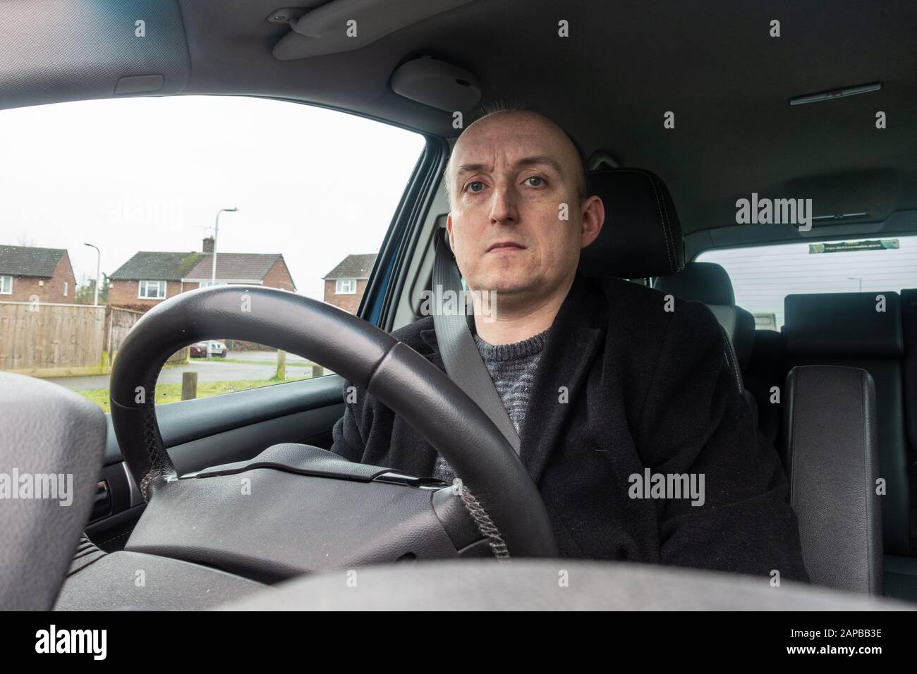 Driving behind steering wheel hires stock photography and images Alamy