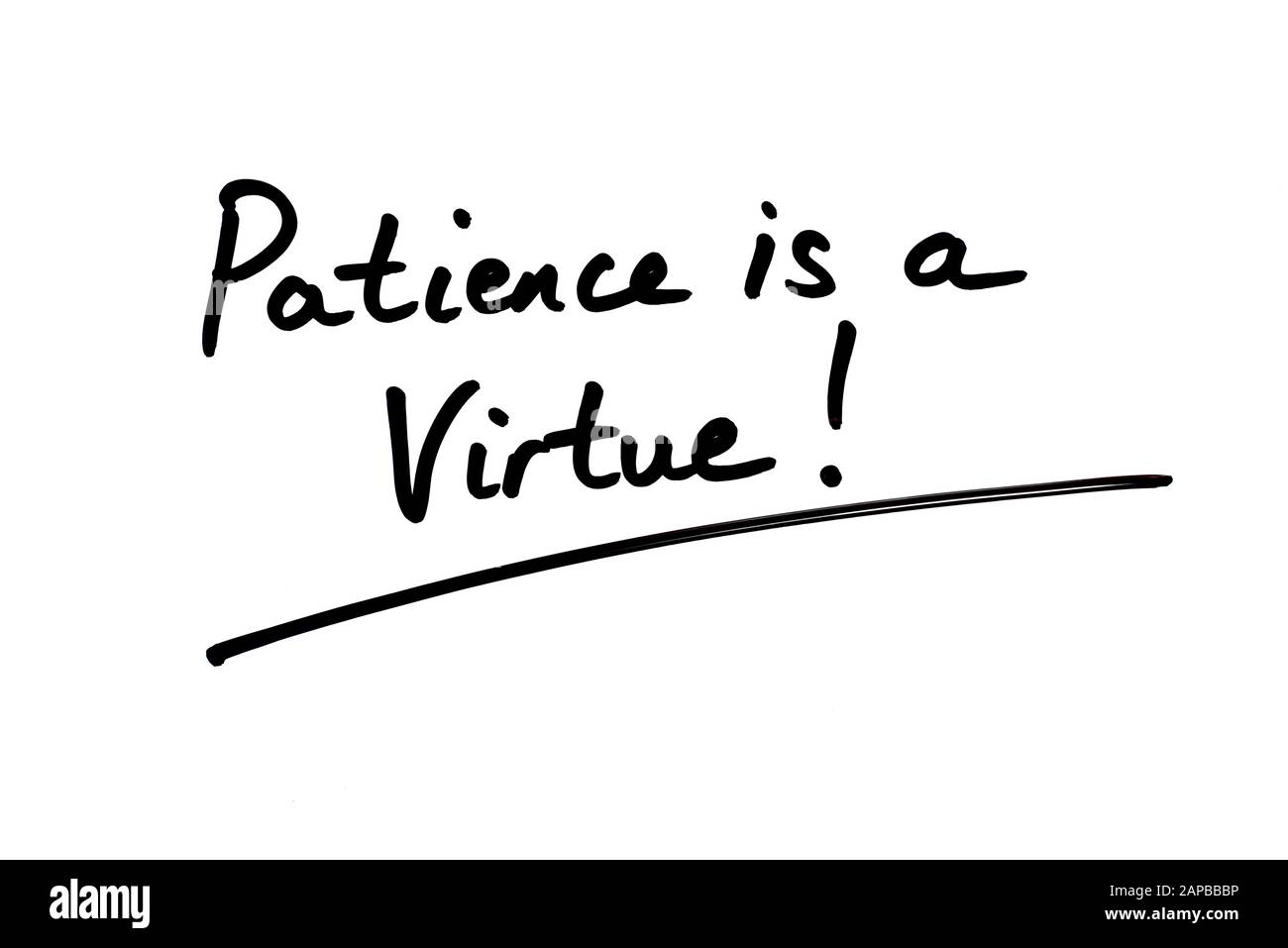 Close-up of the phrase Patience is a Virtue! handwritten on a white background. Stock Photo