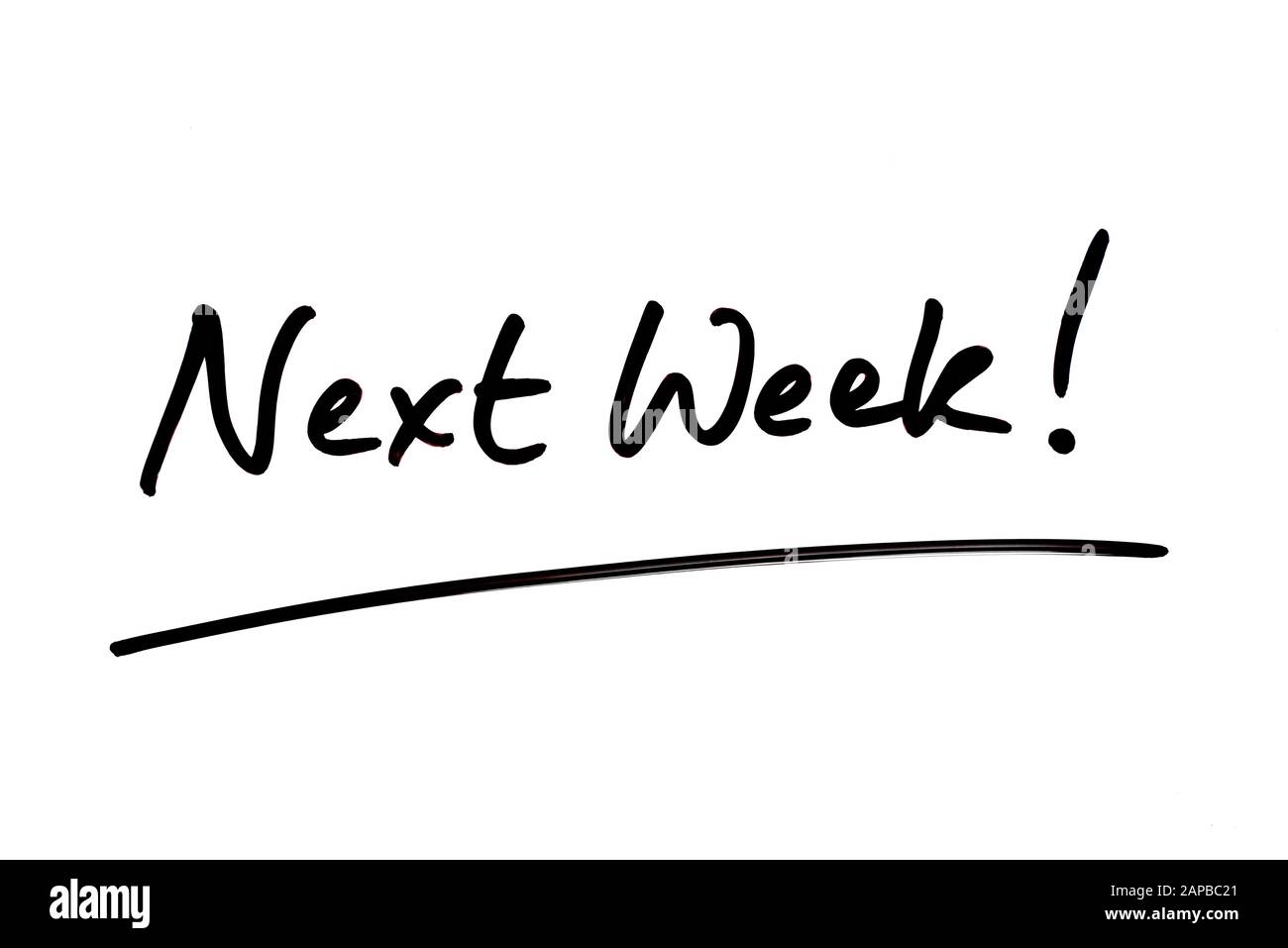 Next Week handwritten on a white background Stock Photo Alamy