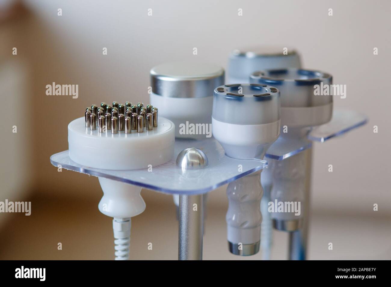 A set of medical instruments for cosmetology apparatus for liposuction and massage, for the correction of the body. Machine. Close-up of various tools of medical. Stock Photo