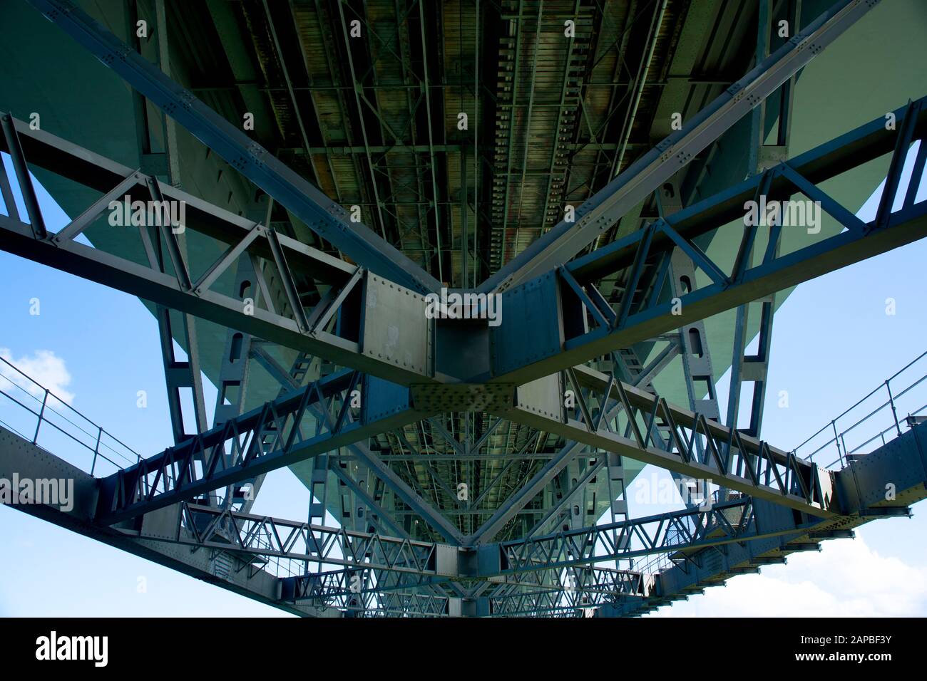 The underside of the harbour bridge from Northcote Point on the North Shore, Auckland, New Zealand. Road and traffic above. Stock Photo