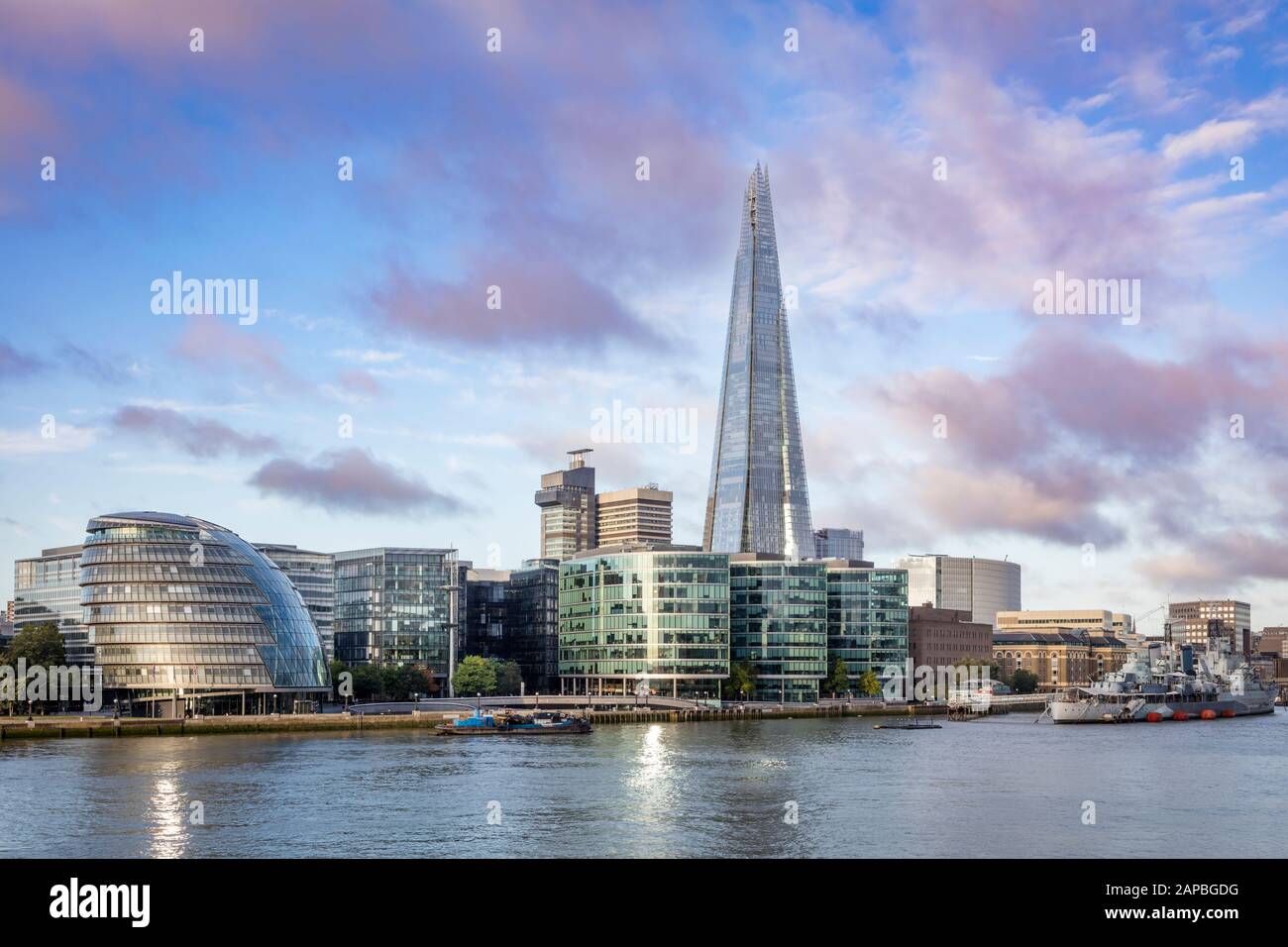 City Hall, the Shard and HMS Belfast along the South Bank, River Thames, London, England, UK Stock Photo