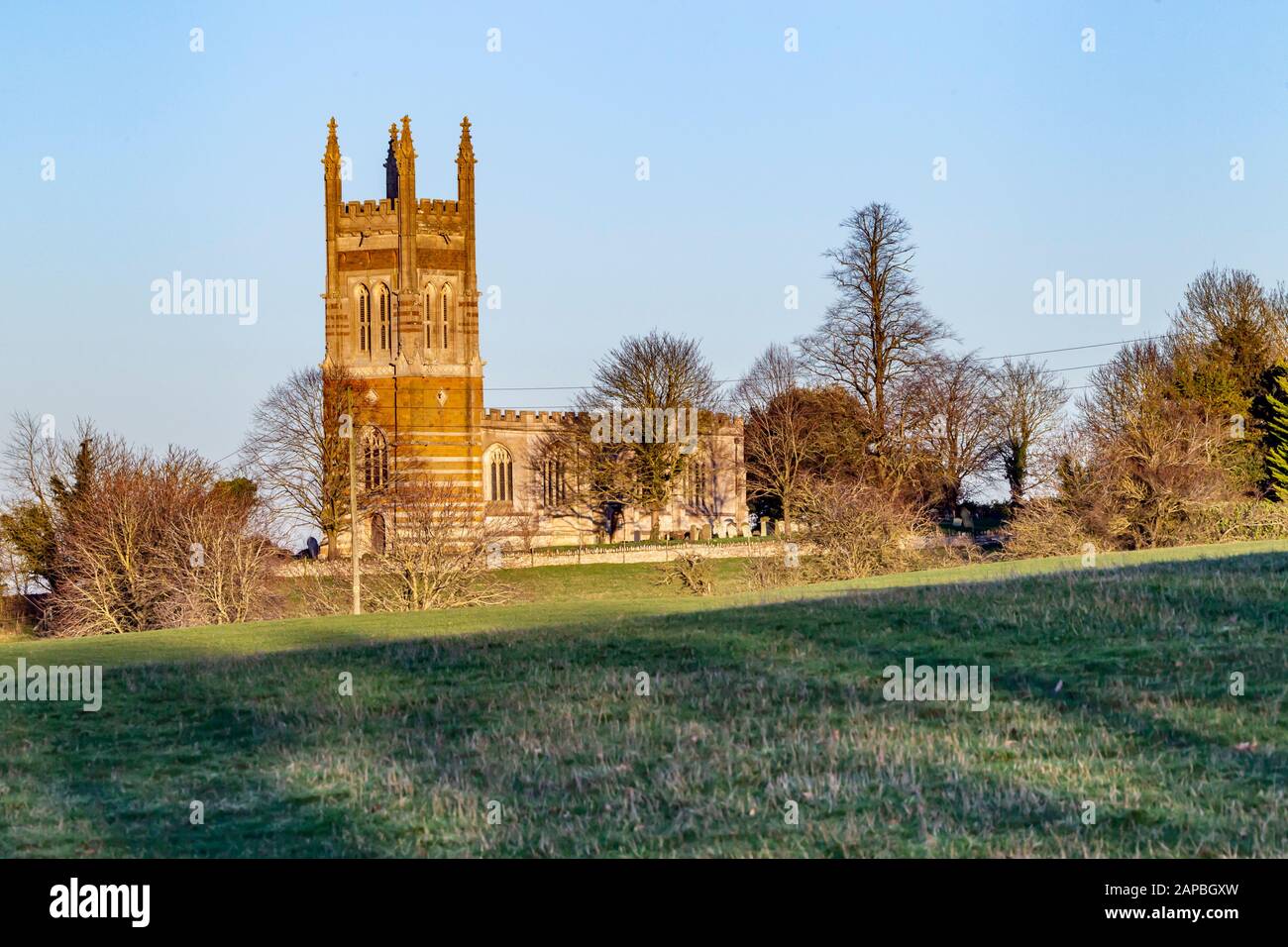 The church of St Mary the Virgin with the late afternoon sun giving the stonework a golden glow