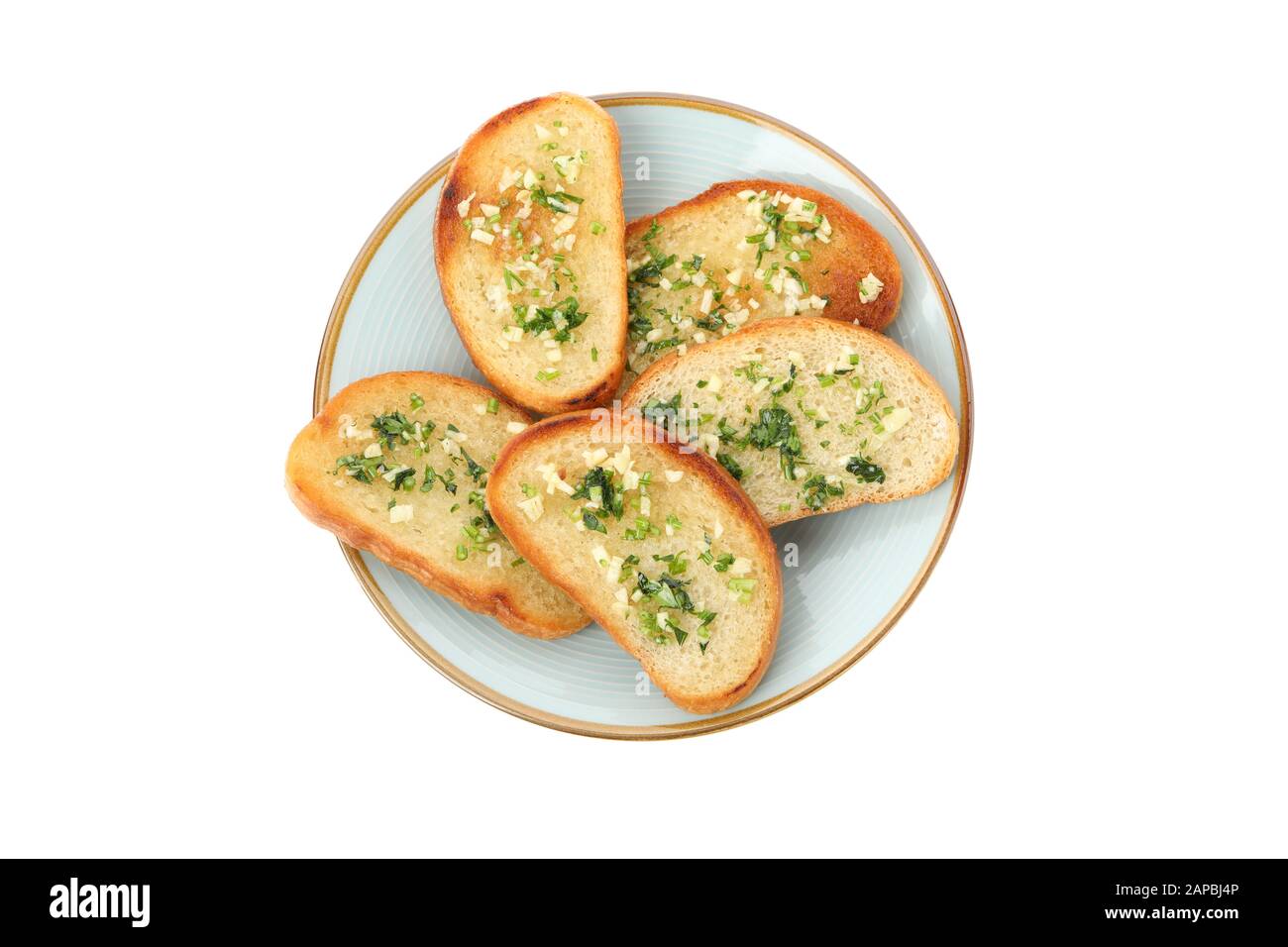 Plate of toasted bread slices with garlic isolated on white background ...