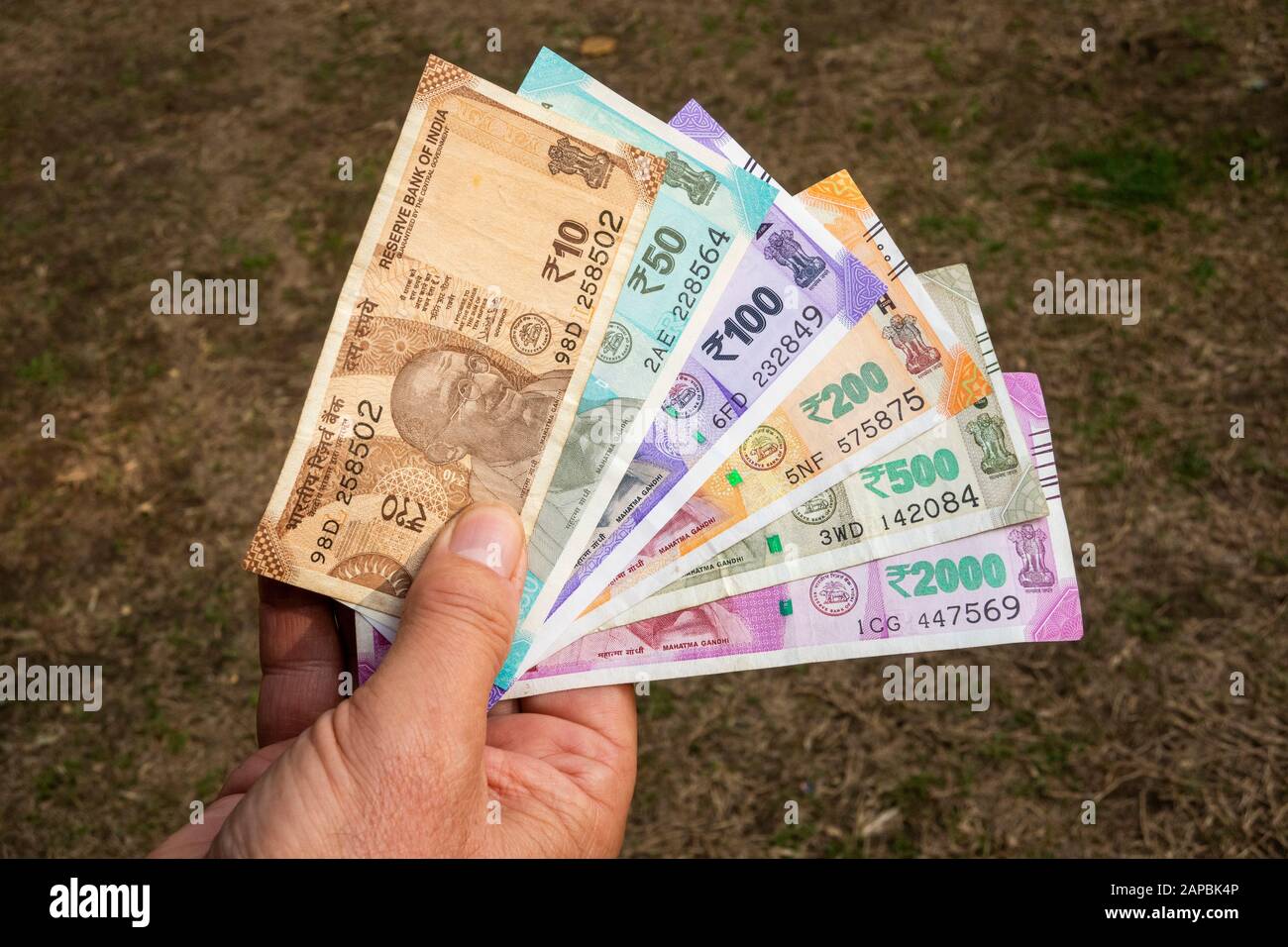 India, money, hand holding 2020 Reserve Bank of India currency banknotes Stock Photo