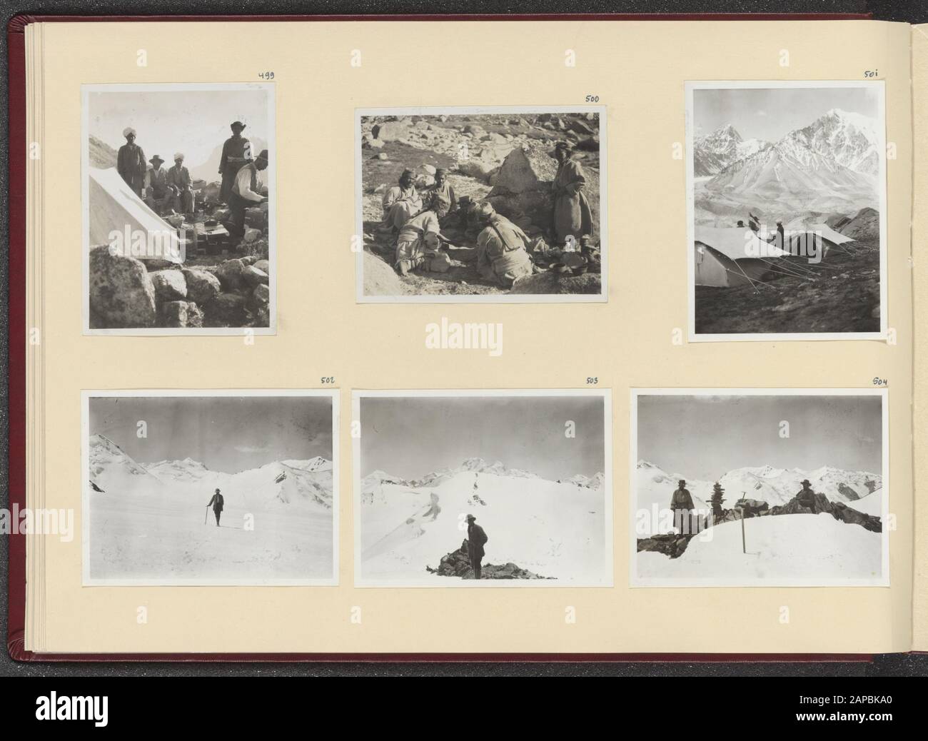 Photoalbum Fisherman: First Karakoru expedition, 1922 Description: Album sheet with six photos. Top left: the field kitchen in the camp in the Lashi valley; upper middle: the coolies playing the dice; upper right: the camp in the Gangmolung valley; lower left: Ph.C. Fisherman on the Gangmolung glacier; lower middle: Ph.C. Fisherman on a pass at the end of the Gangmolung glacier; lower right: coolies at the view from the highest peaks of the Sasir Pass Date: 1922/08/11 Location: India, Karakorum, Pakistan Keywords: mountains, glaciers, kitchens, tents Personal Name: Fisherman, Ph.C. Stock Photo
