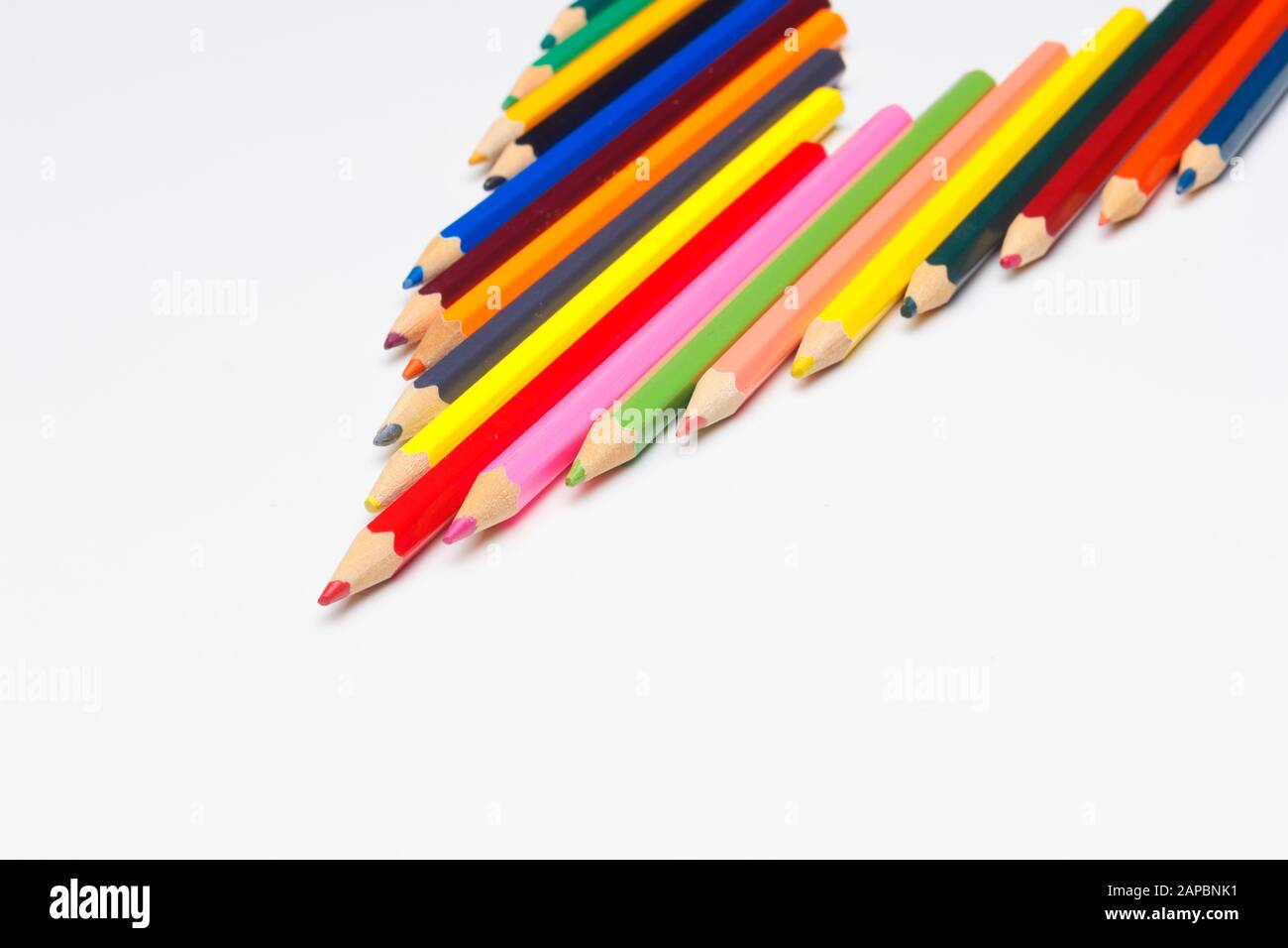 Colored pencils with a sharp point ready to draw and paint drawings