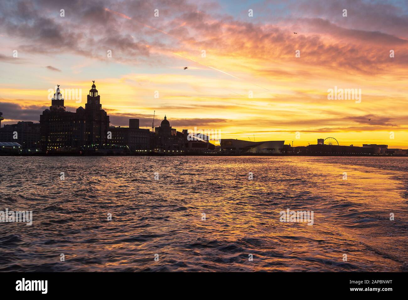 Liverpool city skyline at sunrise. Early morning. River Mersey. Stock Photo