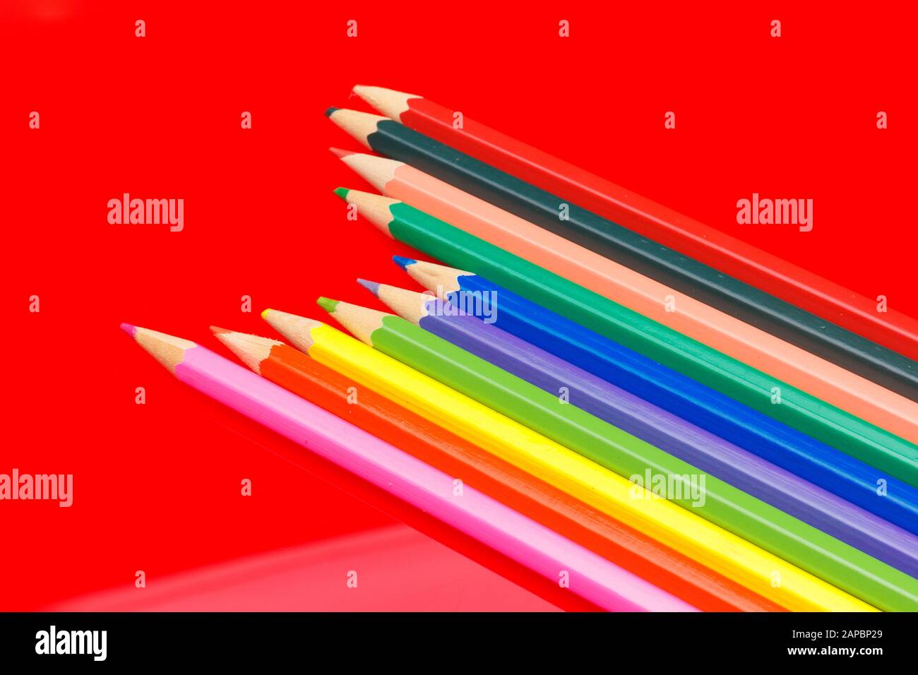 Colored pencils with a sharp point ready to draw and paint drawings