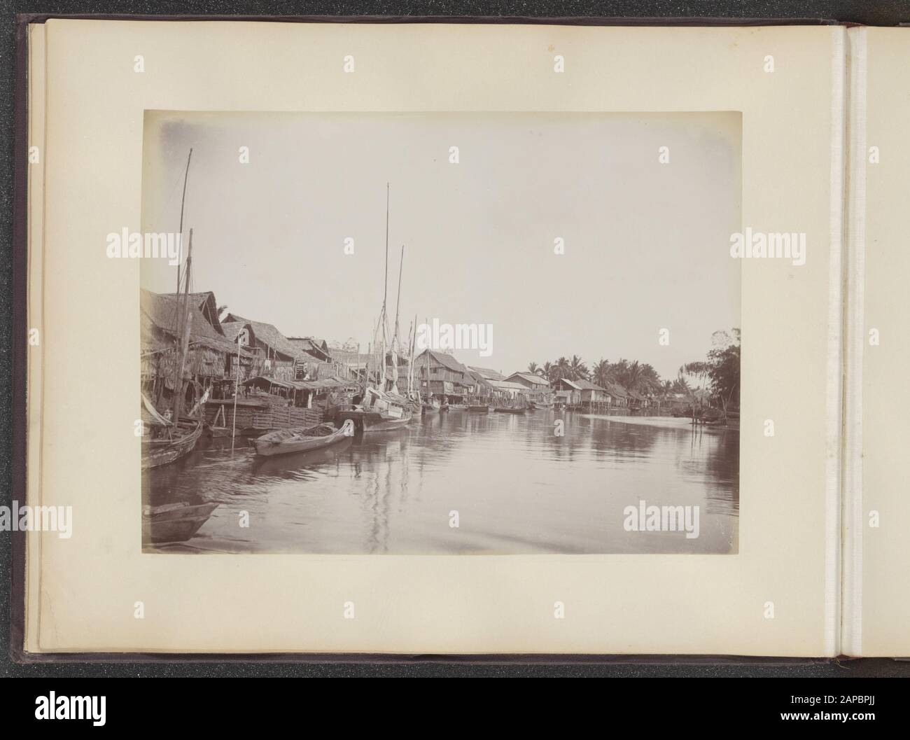 Photo album Deli Company: Sumatra O.K. (Kleingrothe) Description: Above: Kwala-Simpang River (Tamiang). Under: Market at Bindjey Date: 1905 Location: Indonesia, Medan, Dutch East Indies, Sumatra Stock Photo