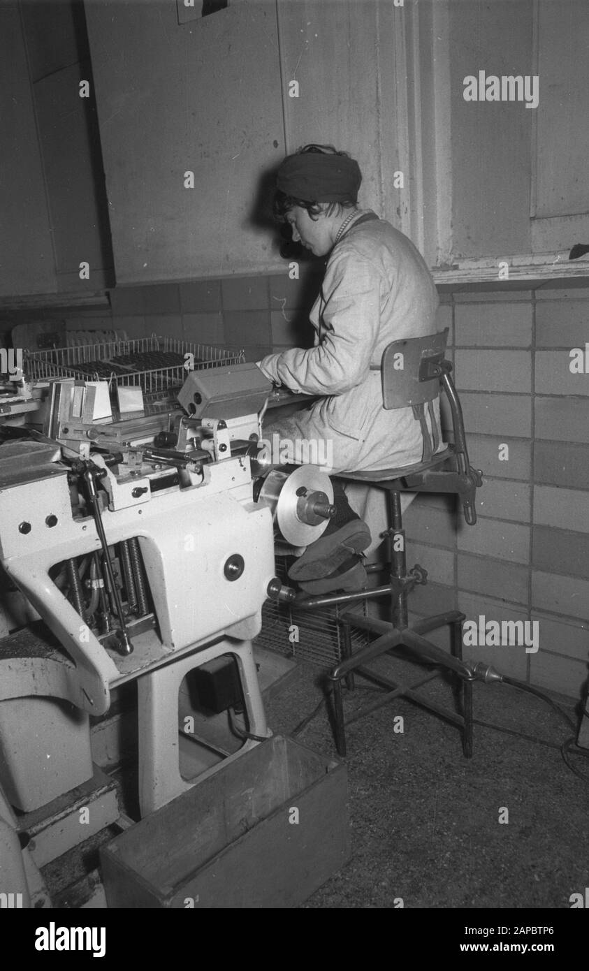 5x5 Chair with footrest attached to it Date: undated Keywords: chairs, footrests, women's labor Stock Photo