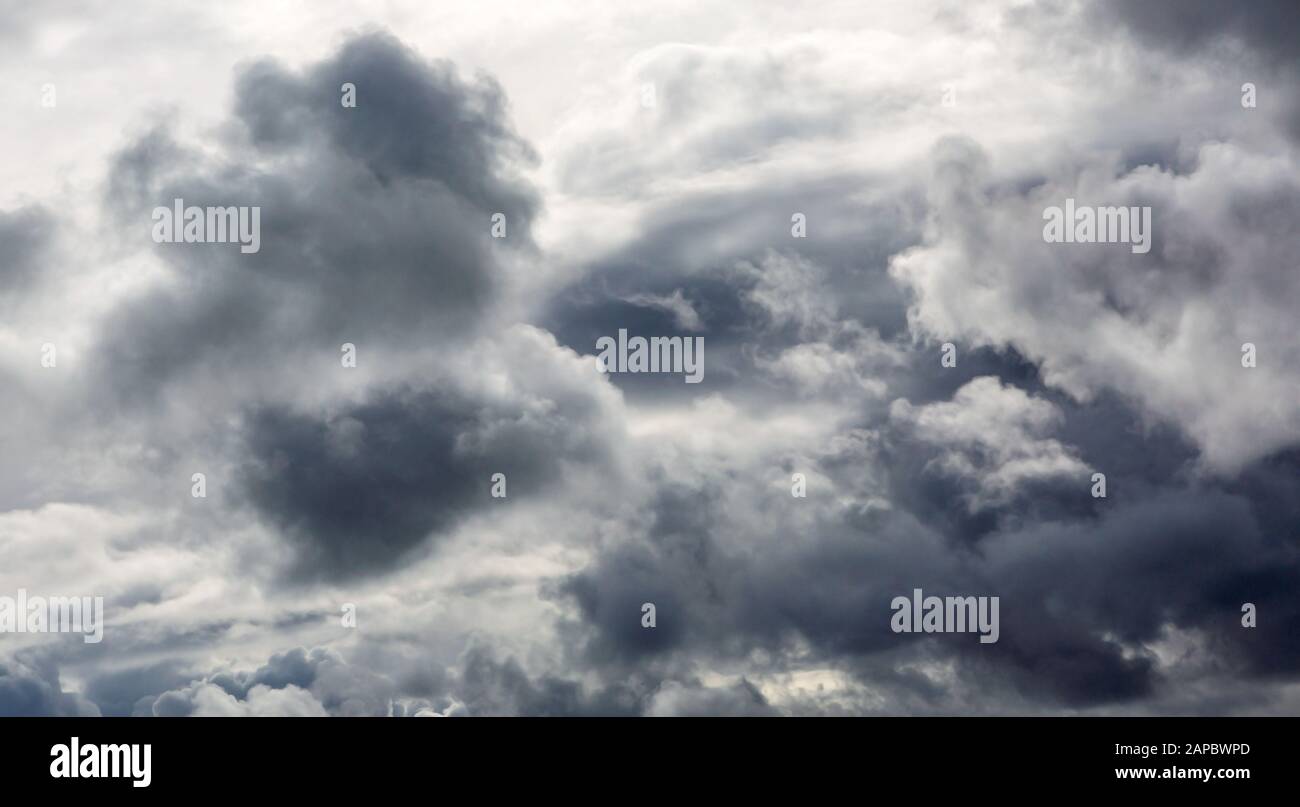The Dark storm clouds background Stock Photo - Alamy