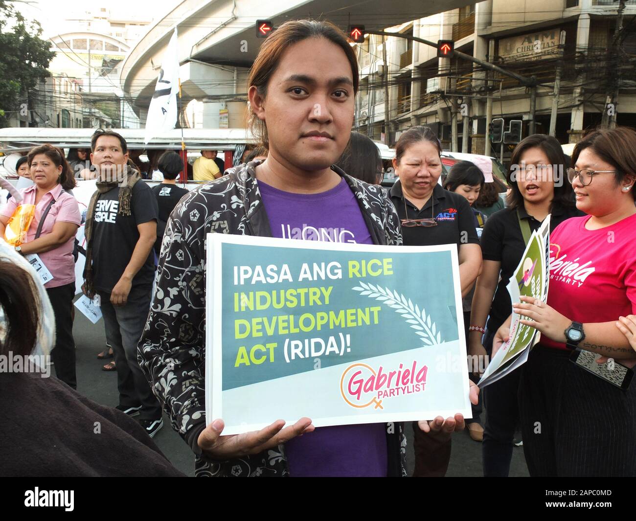 Manila, Philippines. 22nd Jan, 2020. A protester from the LGBT community holds a placard during the demonstration.The Unyon ng mga Manggagawa sa Agrikultura called on the Filipino people to join the fight for genuine agrarian reform to deliver the ultimate justice for the victims of Mendiola Massacre, commemorating the 33rd year of the cold-blooded killing of the 13 farmers at the foot of Mendiola Bridge in Manila. Credit: SOPA Images Limited/Alamy Live News Stock Photo