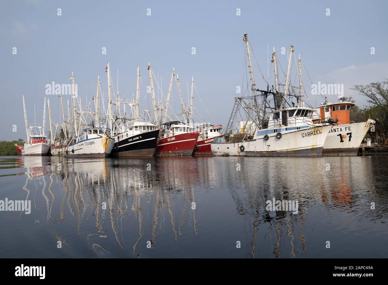 Central America, El Salvador, Gulf of Fonseca. Pacific Ocean fishing boats moored in Jiquilisco Bay. Stock Photo