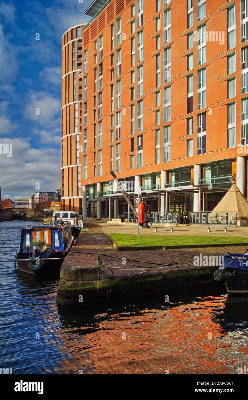 UK,West Yorkshire,Leeds,Granary Wharf and River Aire. The buildings are