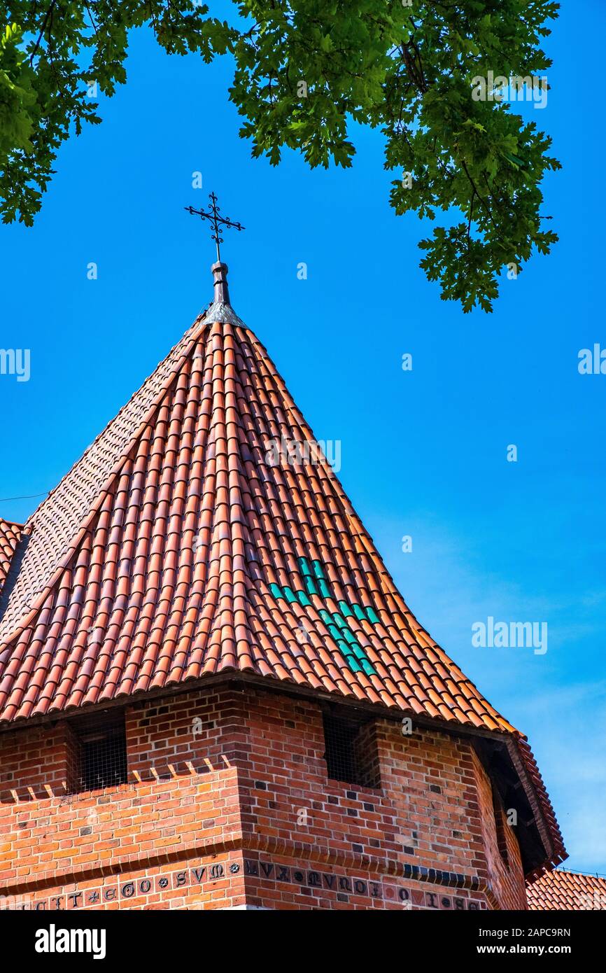 Malbork, Pomerania / Poland - 2019/08/24: Characteristic gothic defence tower brick tile roofing of the medieval Teutonic Order Castle in Malbork, Pol Stock Photo