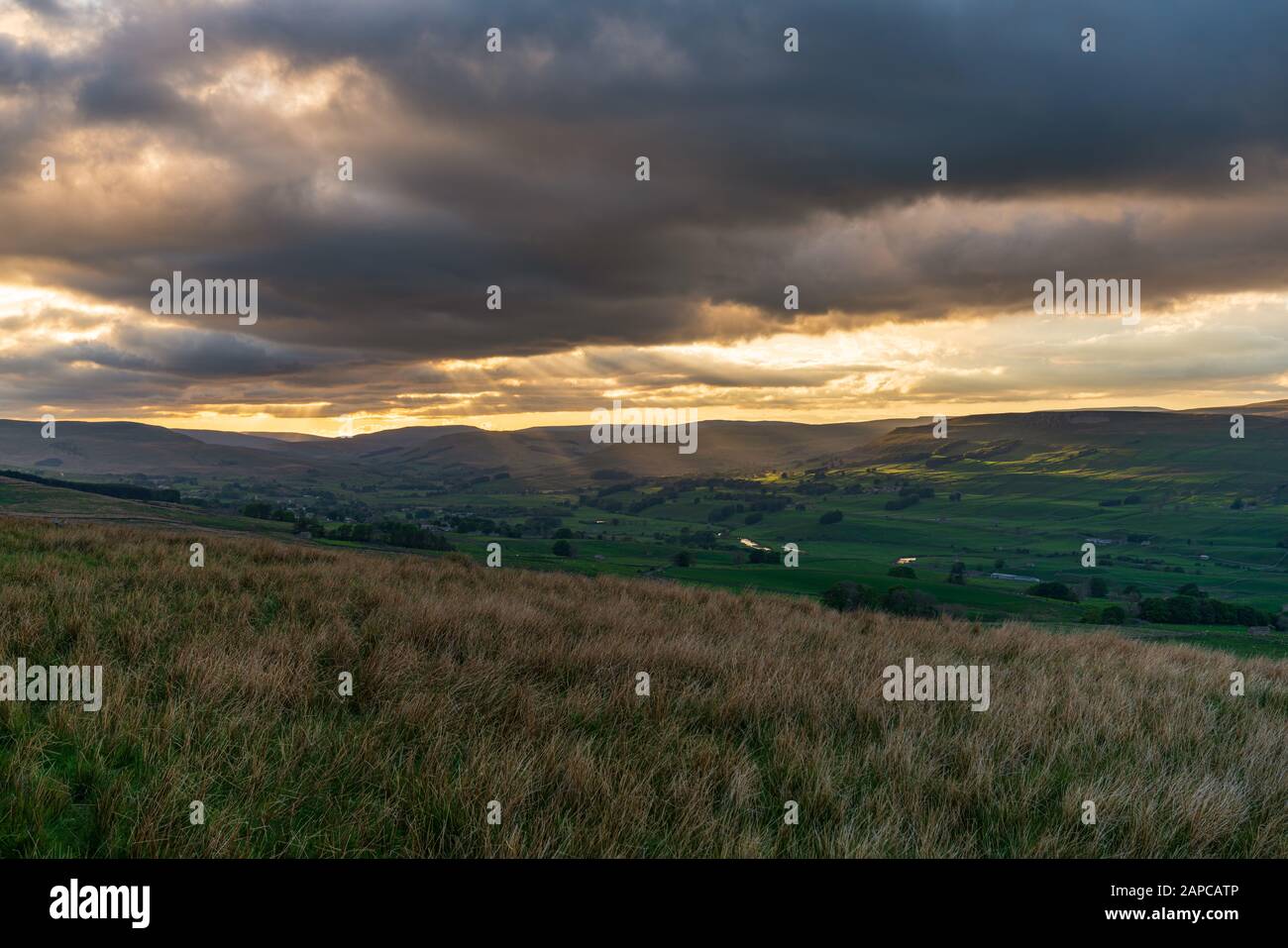 A cloudy sunset in the Yorkshire Dales near Countersett, North Yorkshire, England, UK Stock Photo