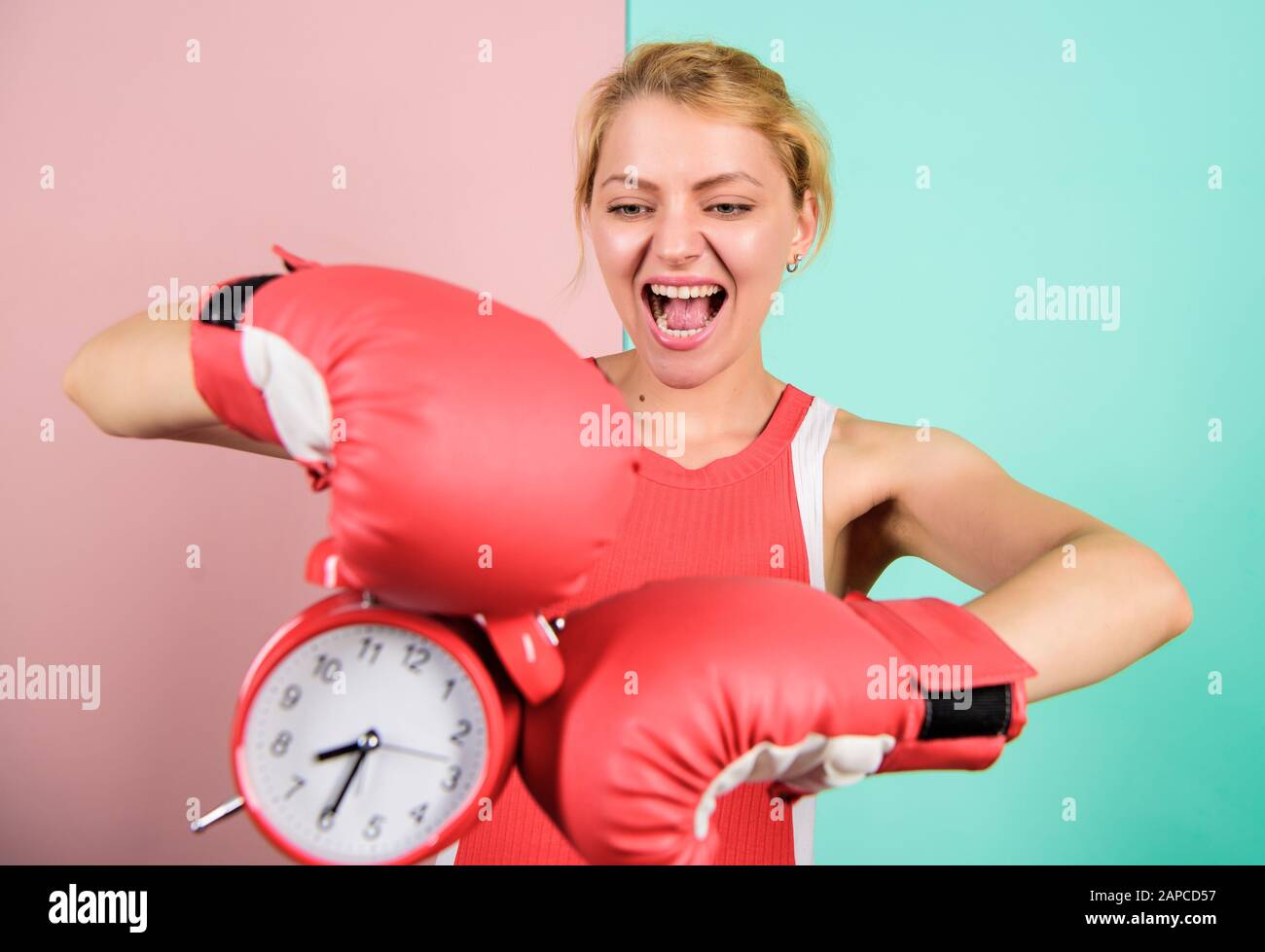 fighting with alarm clock. time to fight. time for success. win the day