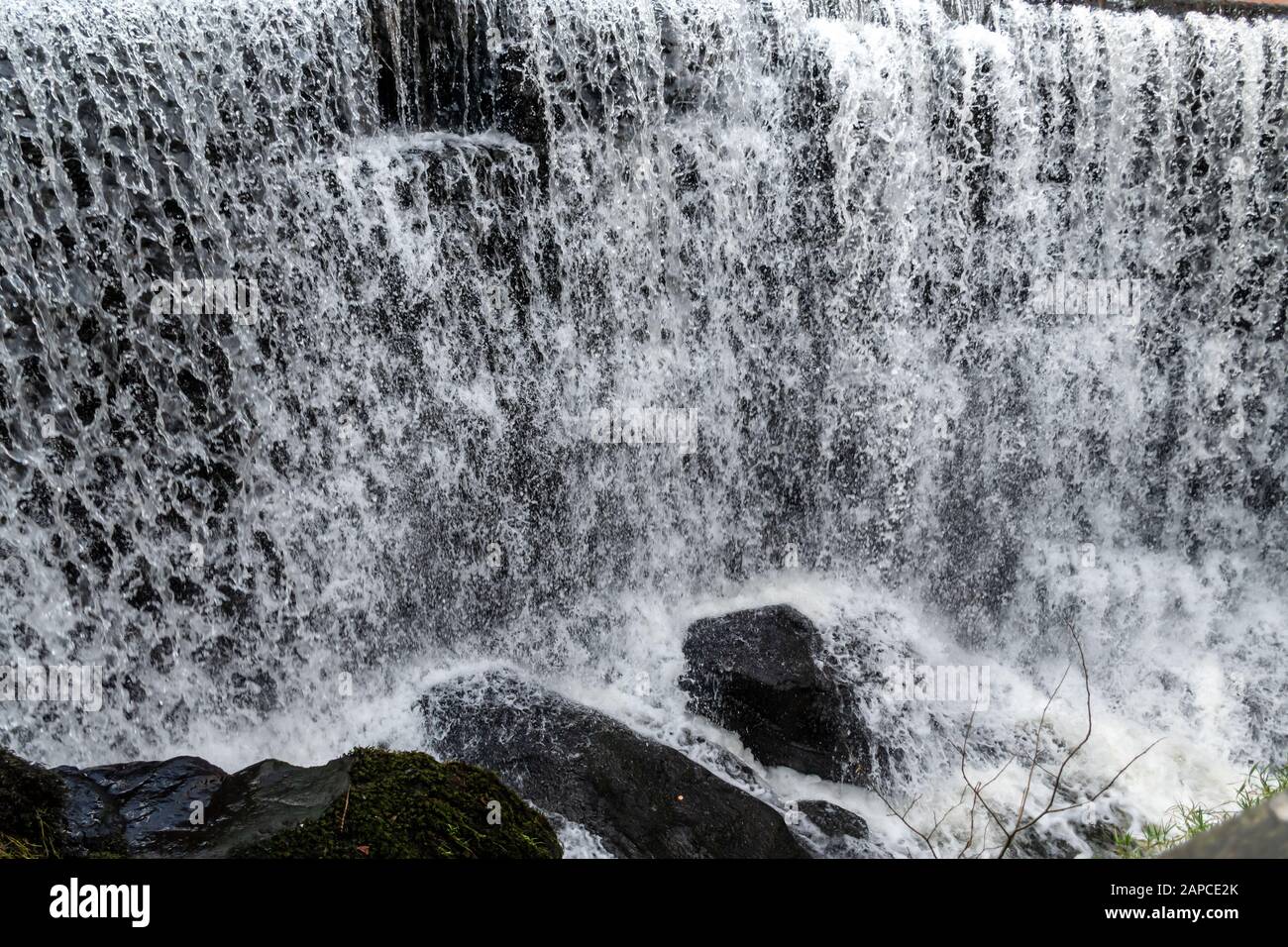Waterfall at Rouken Glen Park in Thornliebank, East Renfrewshire near Glasgow Stock Photo